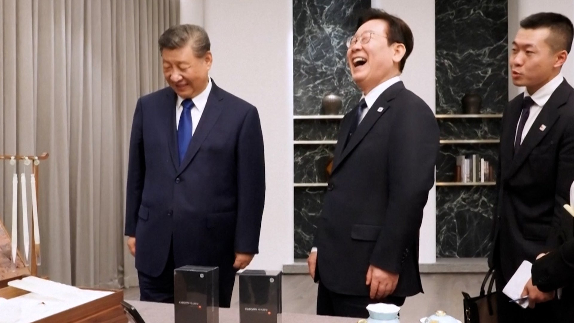 Lee Jae myung laughs