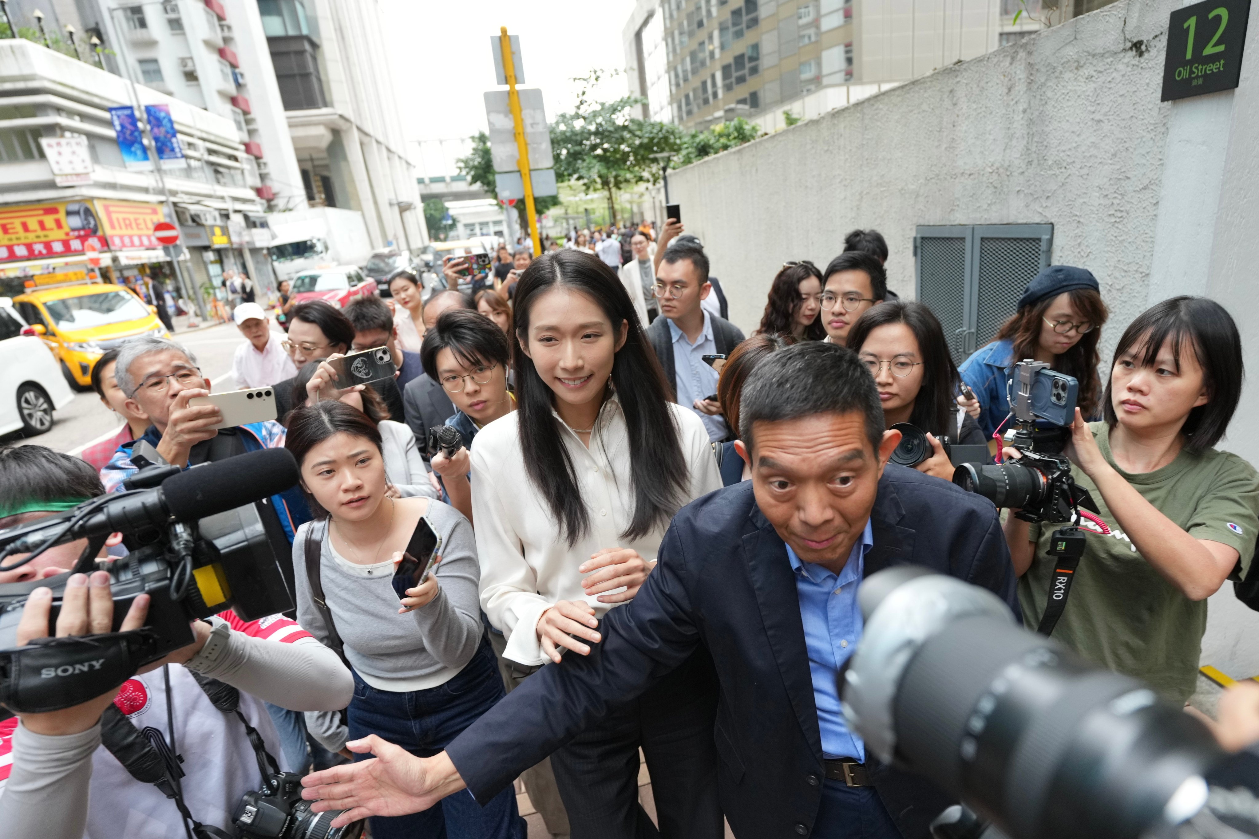 Hong Kong Olympic gold medallist Vivian Kong (centre) has declared her bid to run for the tourism constituency in the Legislative Council election. Photo: Karma Lo