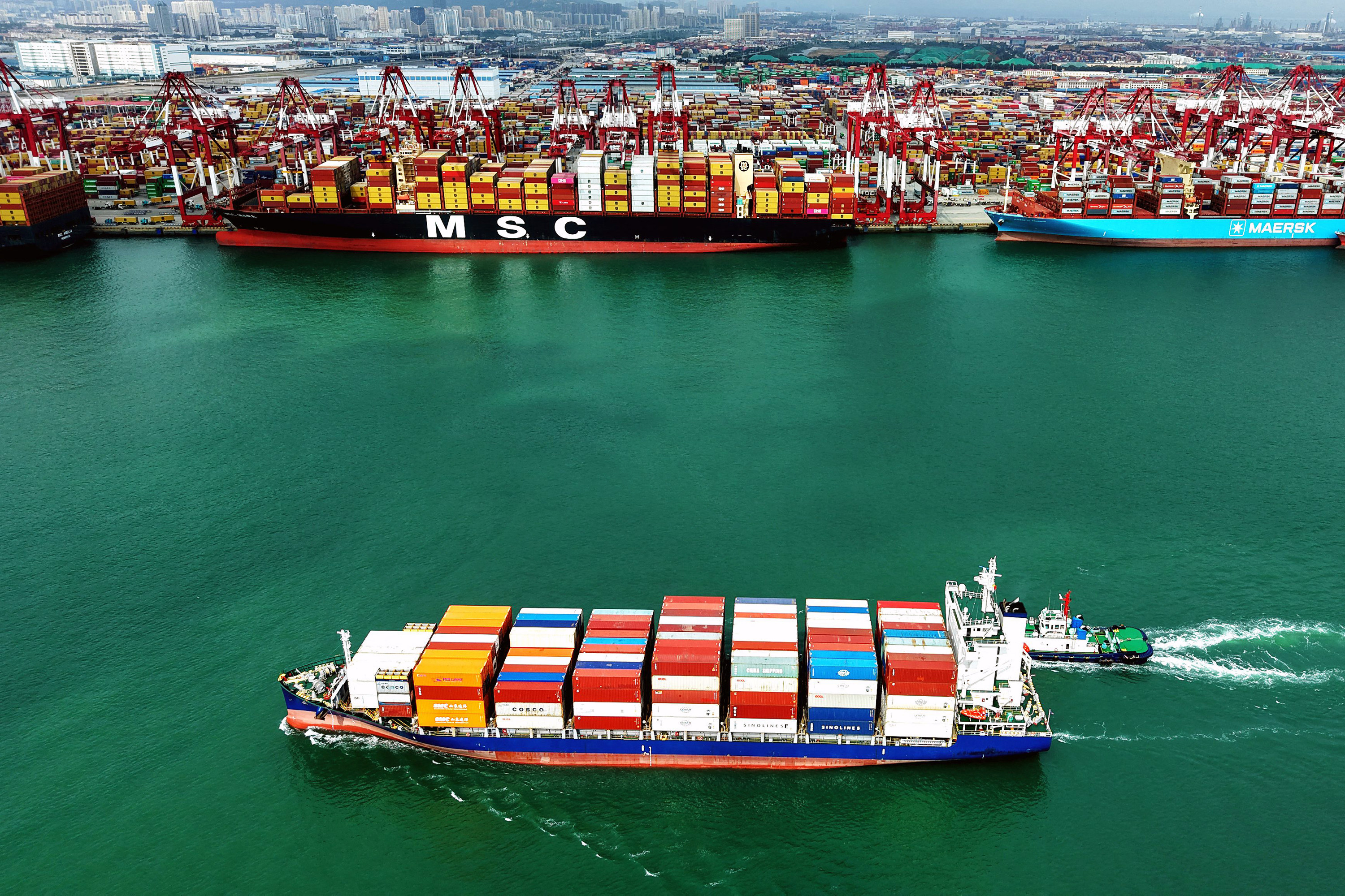 A container ship sails past the port in Qingdao, in China’s eastern Shandong province, on October 9. Photo: AFP / Getty Images / TNS