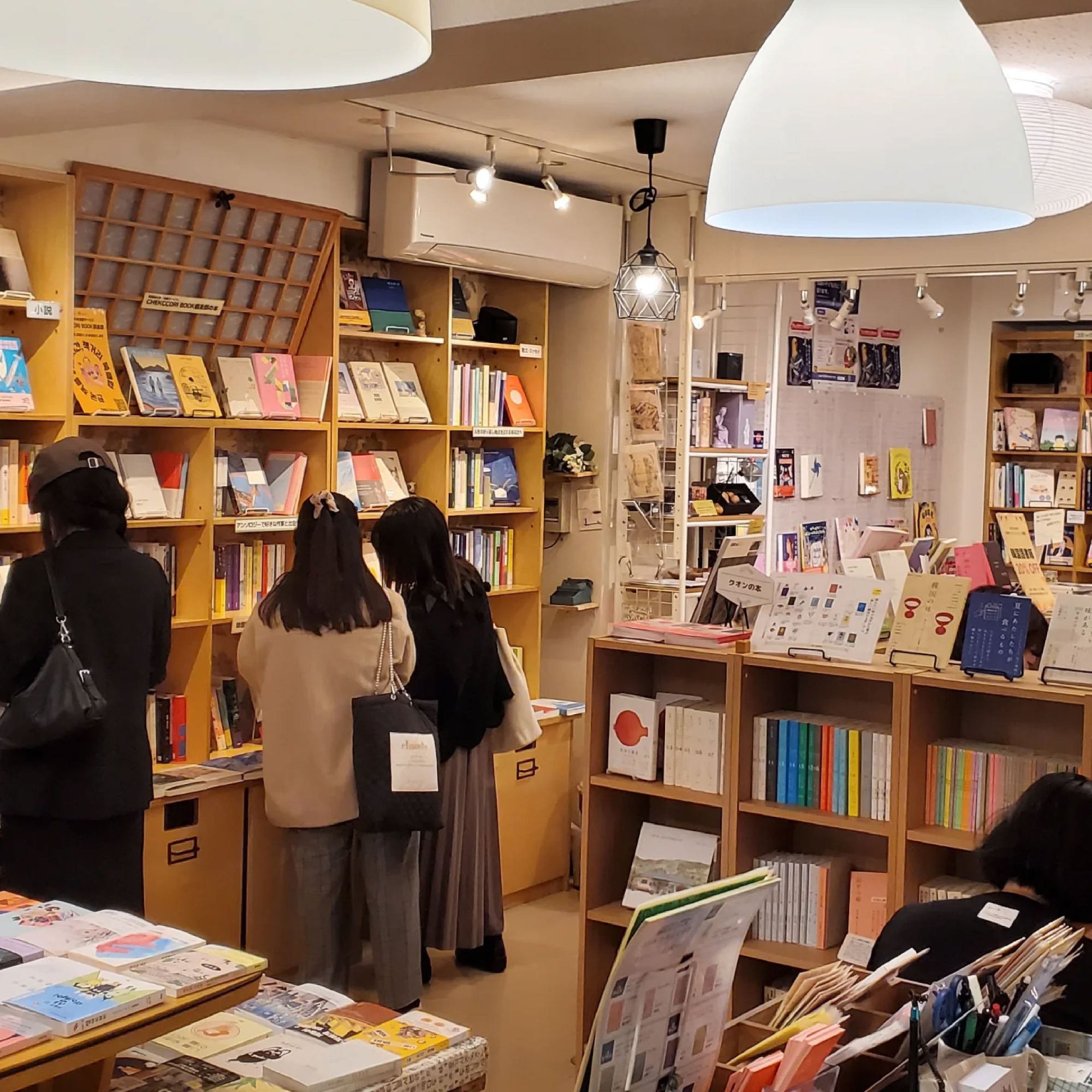 Visitors browse the shelves for books at Chekccori. Photo: Instagram/chekccori