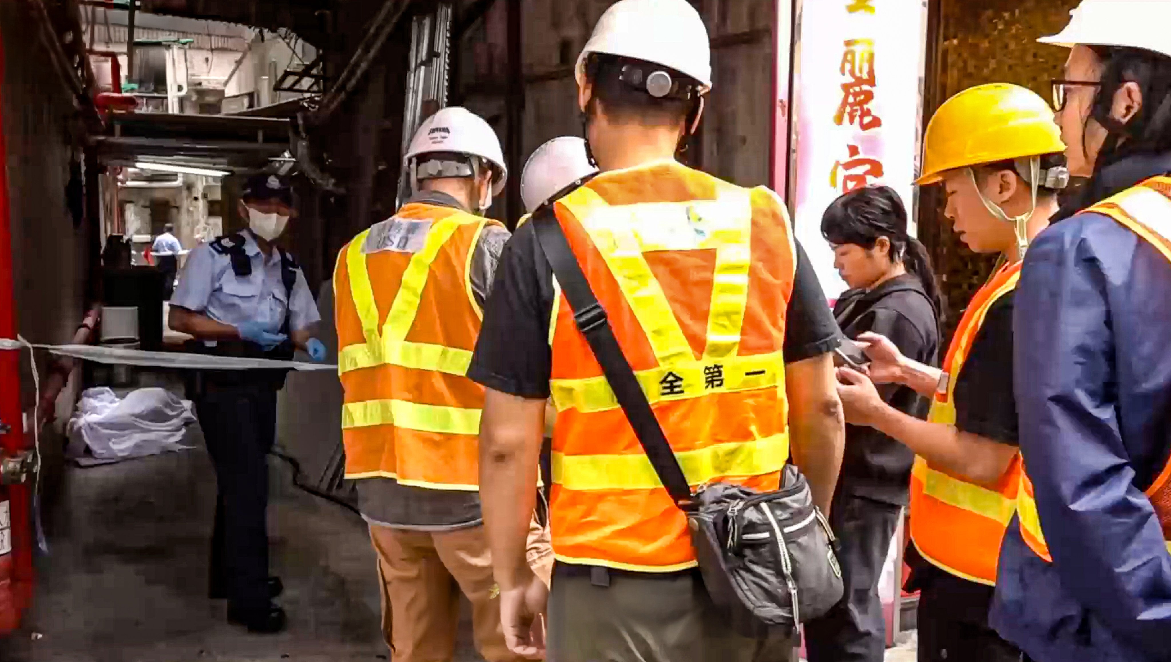 A man has been found dead next to a drainage channel in Mong Kok. Photo: Cable TV news