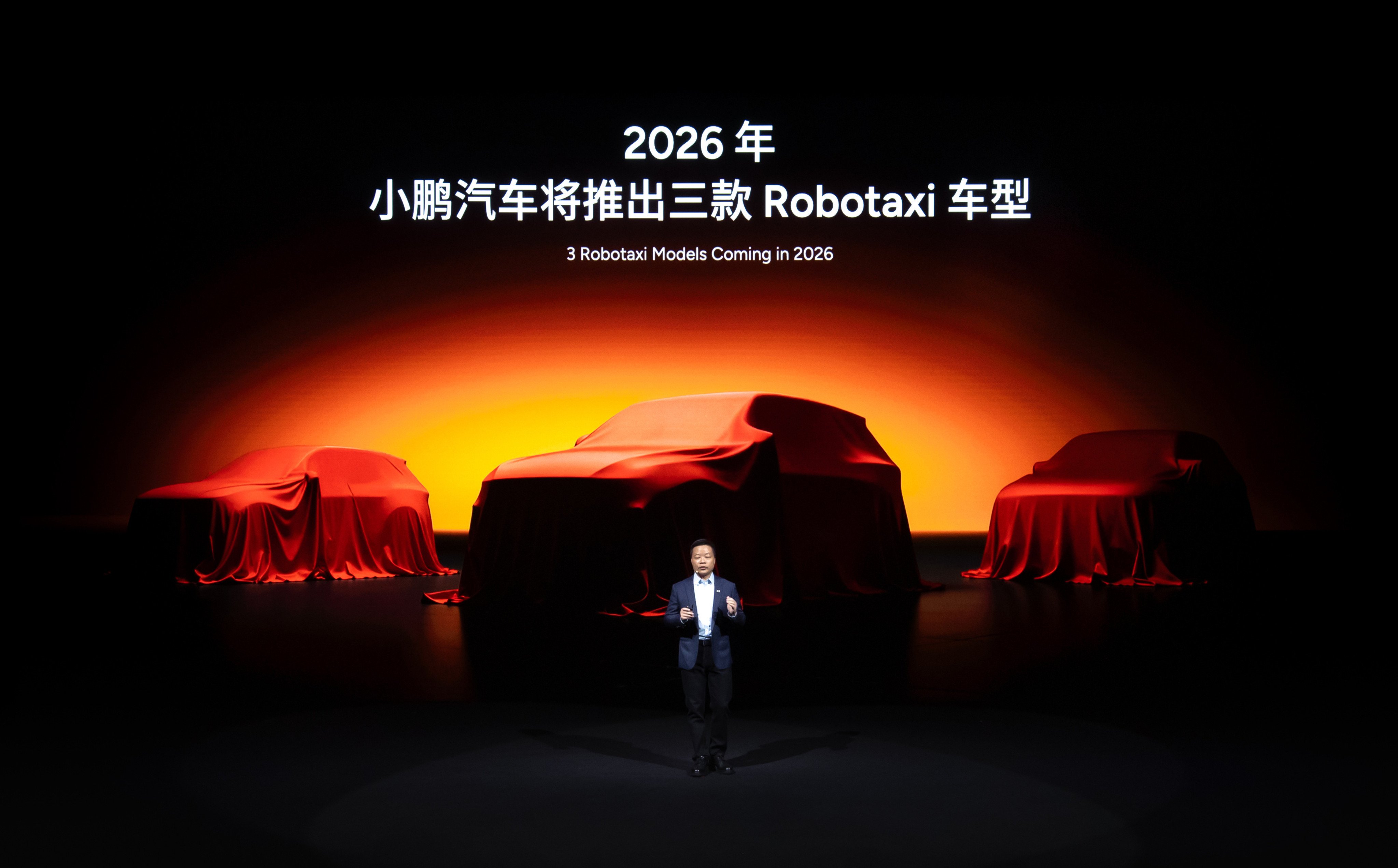 He Xiaopeng, Xpeng’s chairman and CEO, introduces the company’s robotaxis at the company’s headquarters in Guangzhou, in southern China’s Guangdong province, on November 5, 2025. Photo: Handout