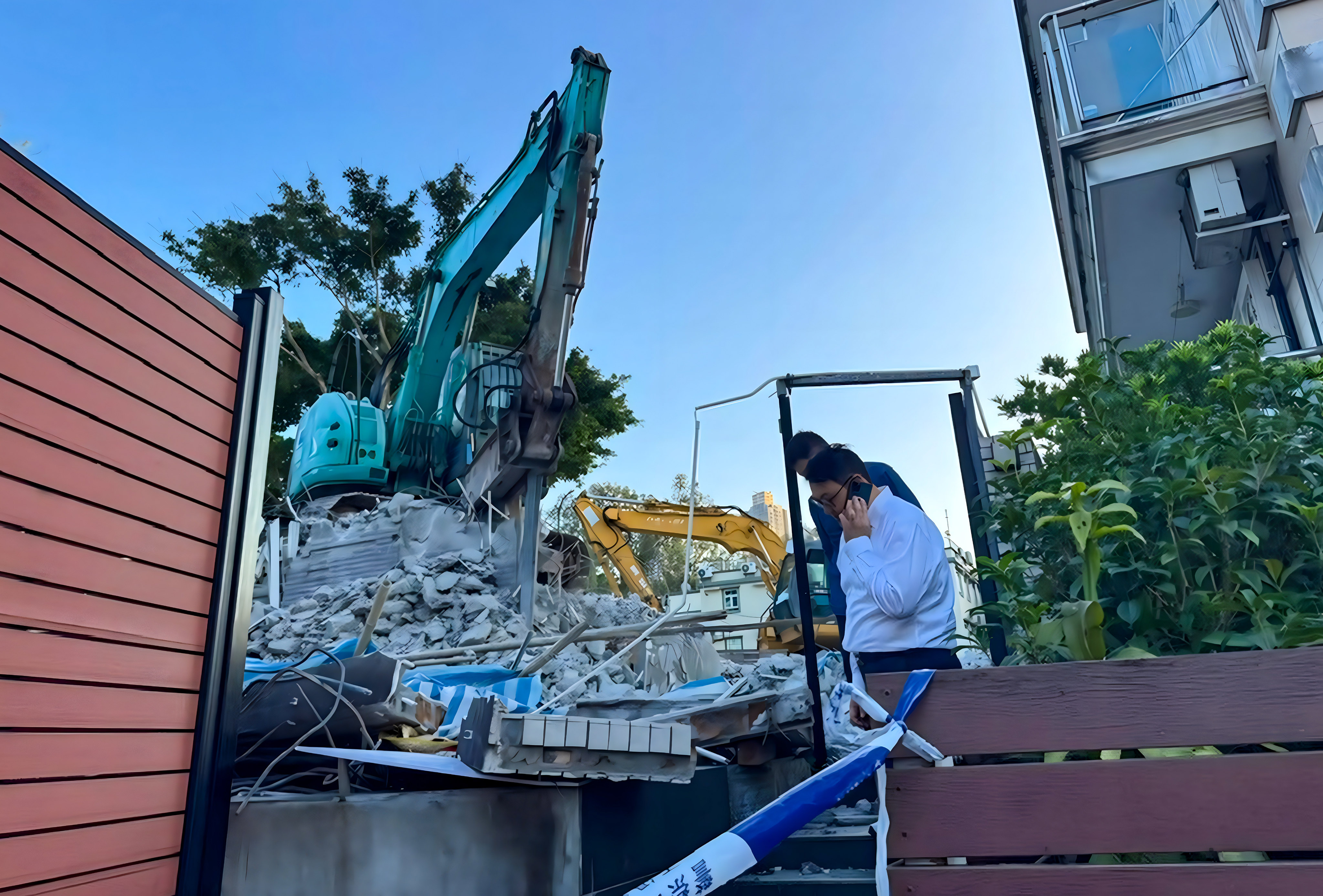 The woman was killed after the perimeter wall of the village house in Yuen Long collapsed during demolition works. Photo: Handout