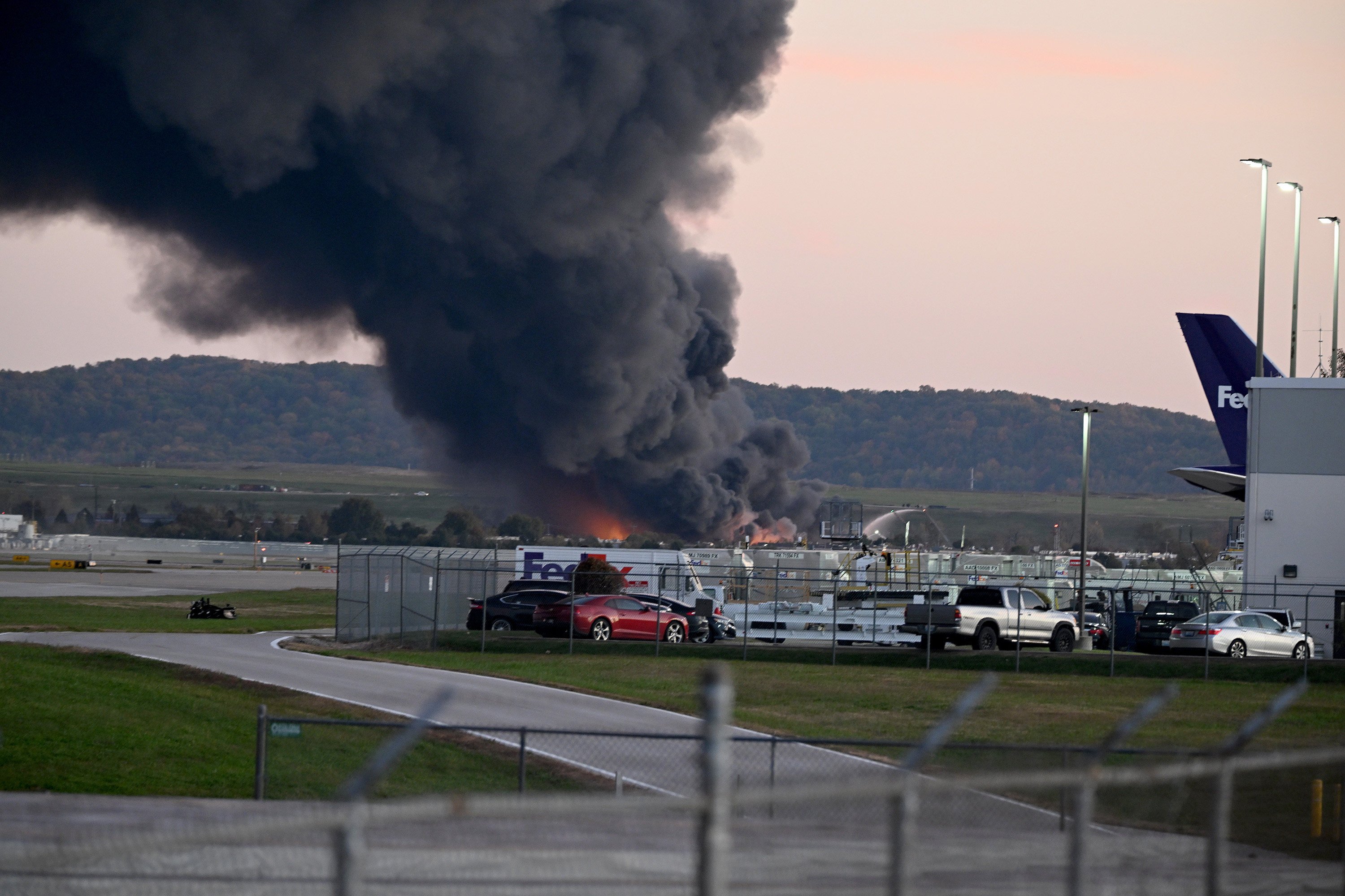 Fire and smoke where a UPS cargo plane crashed near Louisville Muhammad Ali International Airport in Louisville, Kentucky. Photo: AFP