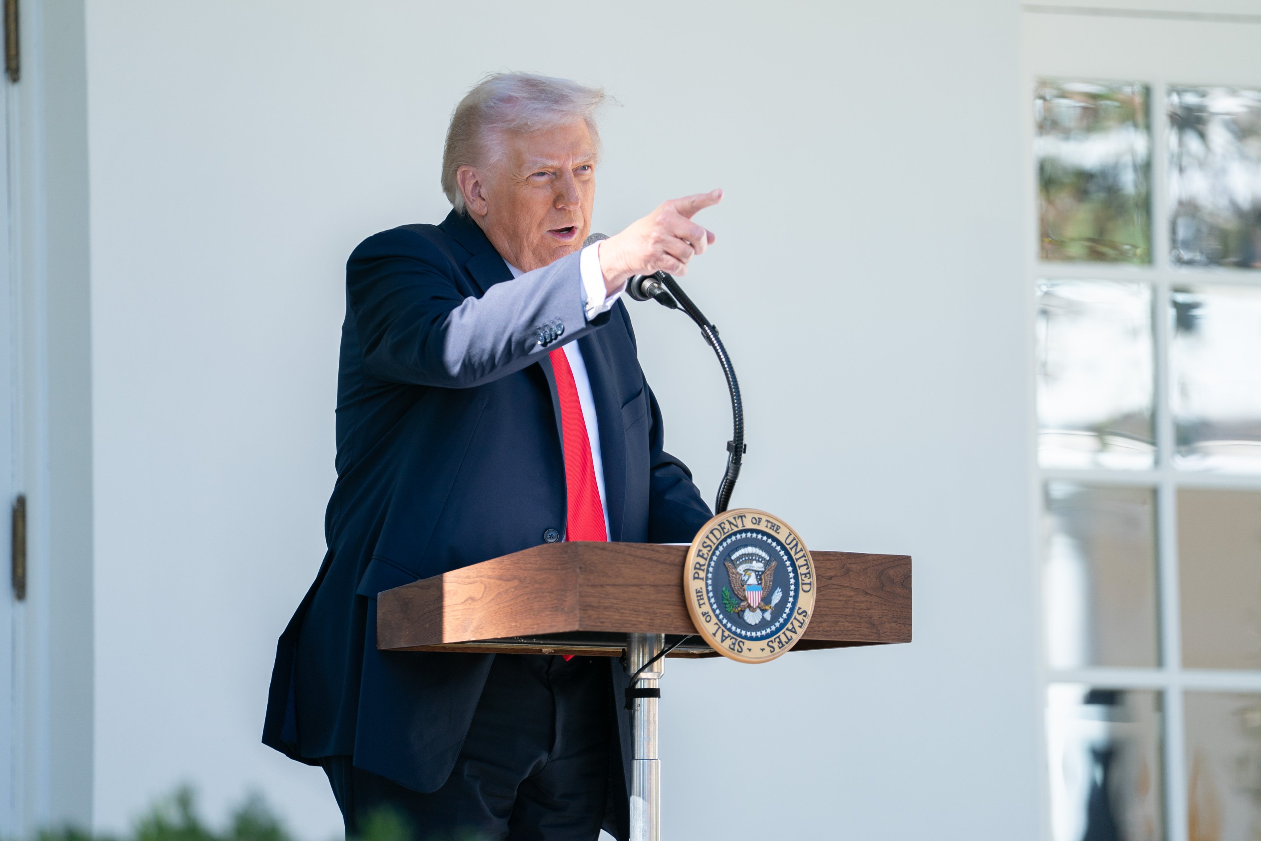 US President Donald Trump speaks during a lunch with Republican Senators in the Rose Garden of the White House last month. Photo: EPA
