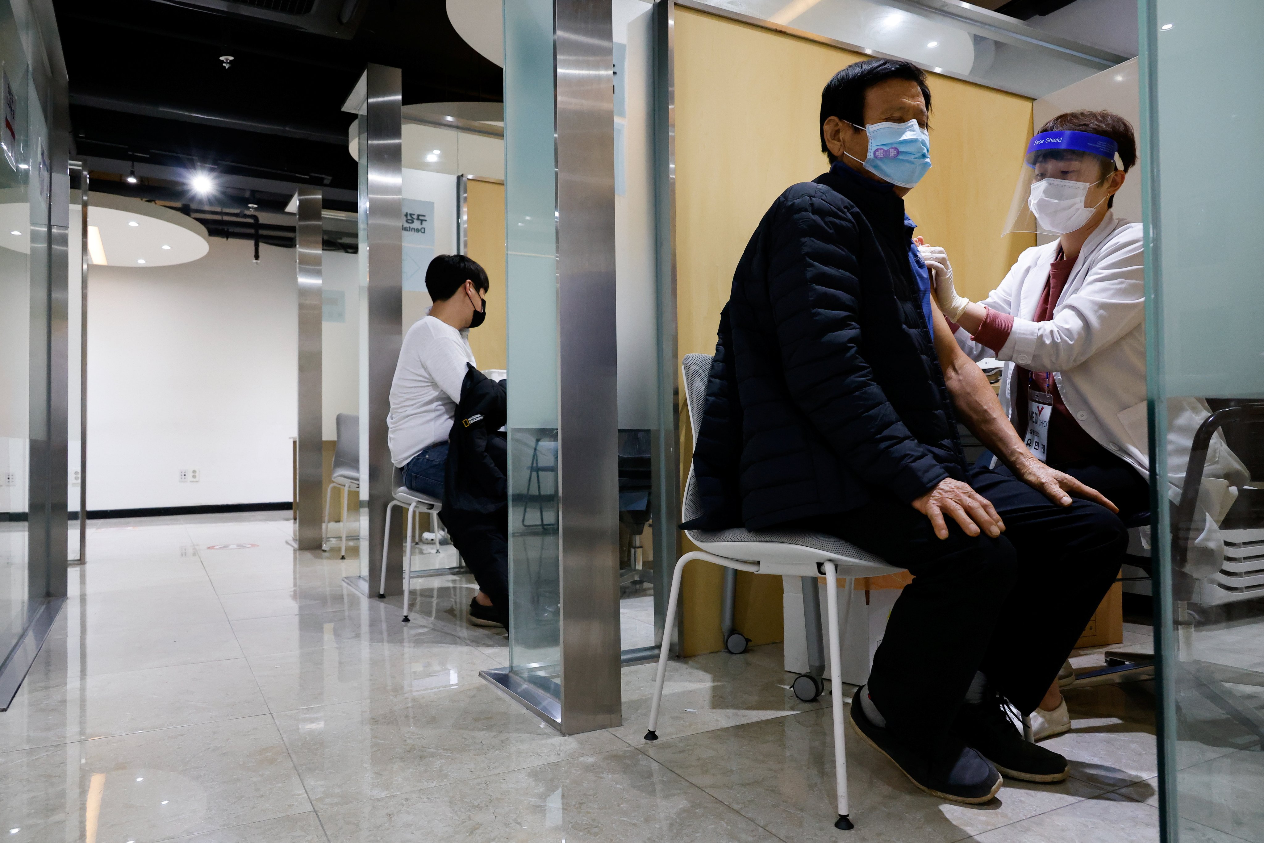 A man gets an influenza vaccine at a Seoul health centre in 2020. Photo: Reuters