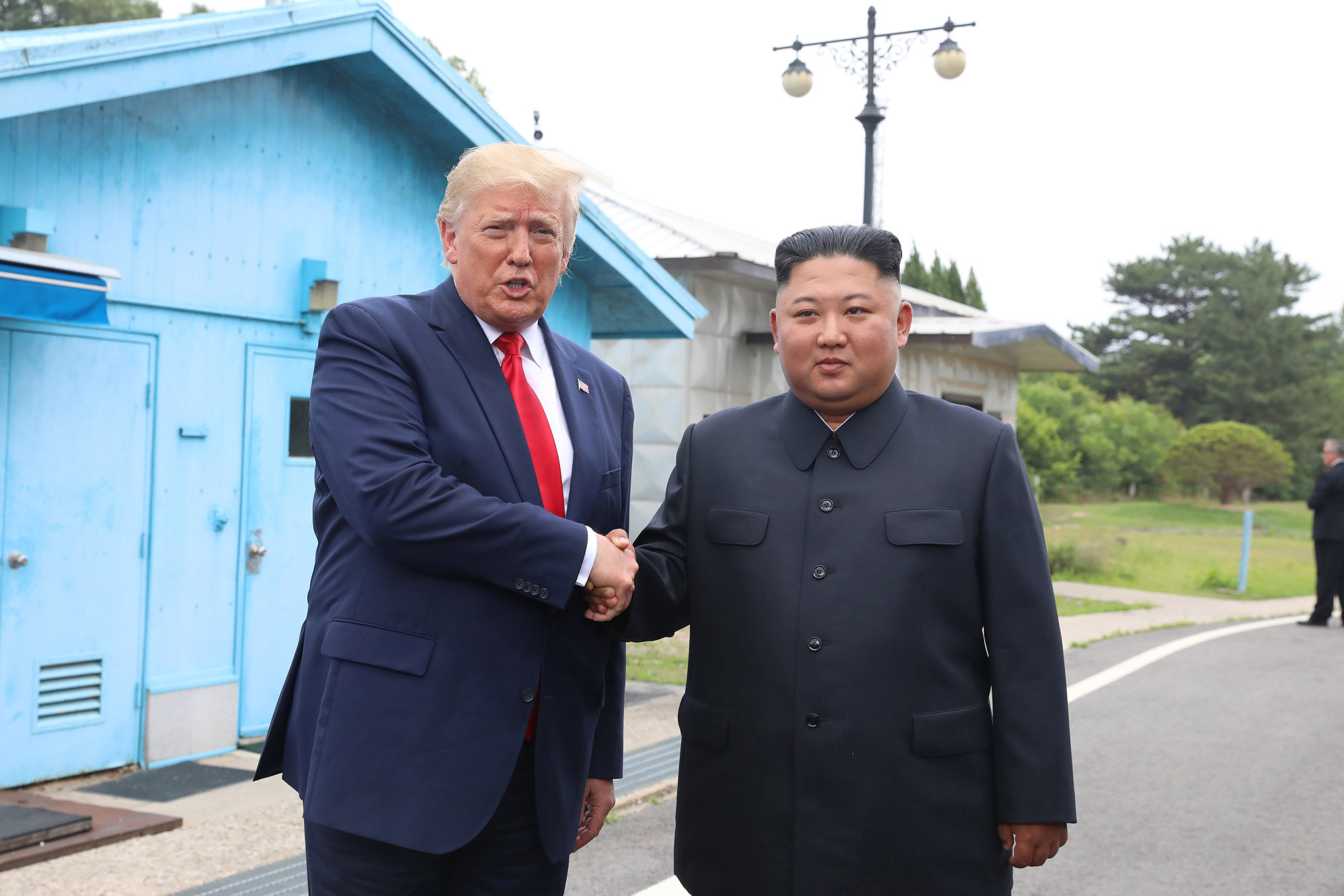 North Korean leader Kim Jong-un and US President Donald Trump meet inside the demilitarised zone separating the South and North Korea on June 30, 2019. Photo: TNS North Korean leader Kim Jong-un and US President Donald Trump meet inside the demilitarised zone separating the South and North Korea on June 30, 2019. Photo: TNS