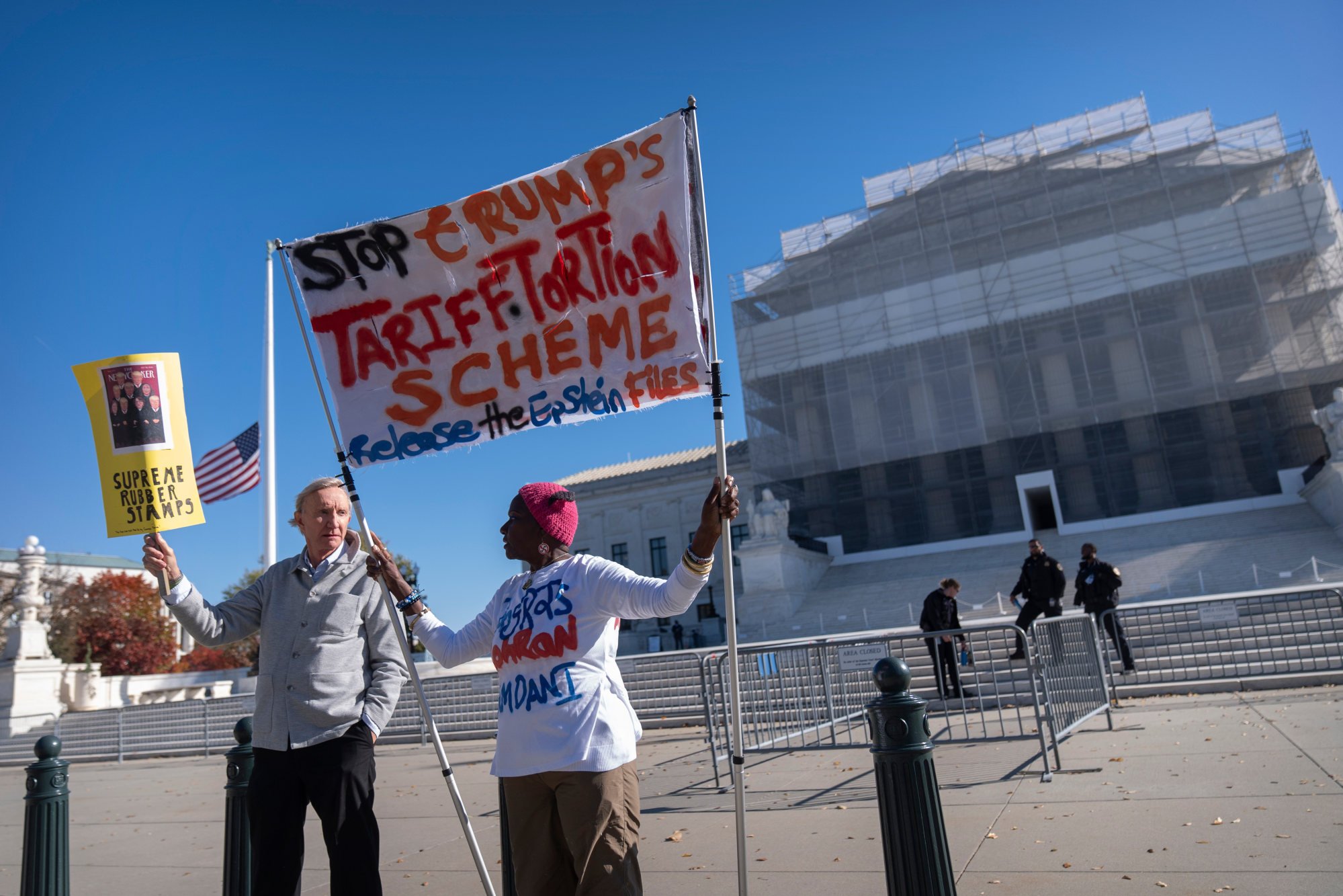 Protesters stand outside the Supreme Court on Wednesday in Washington. Photo: AP