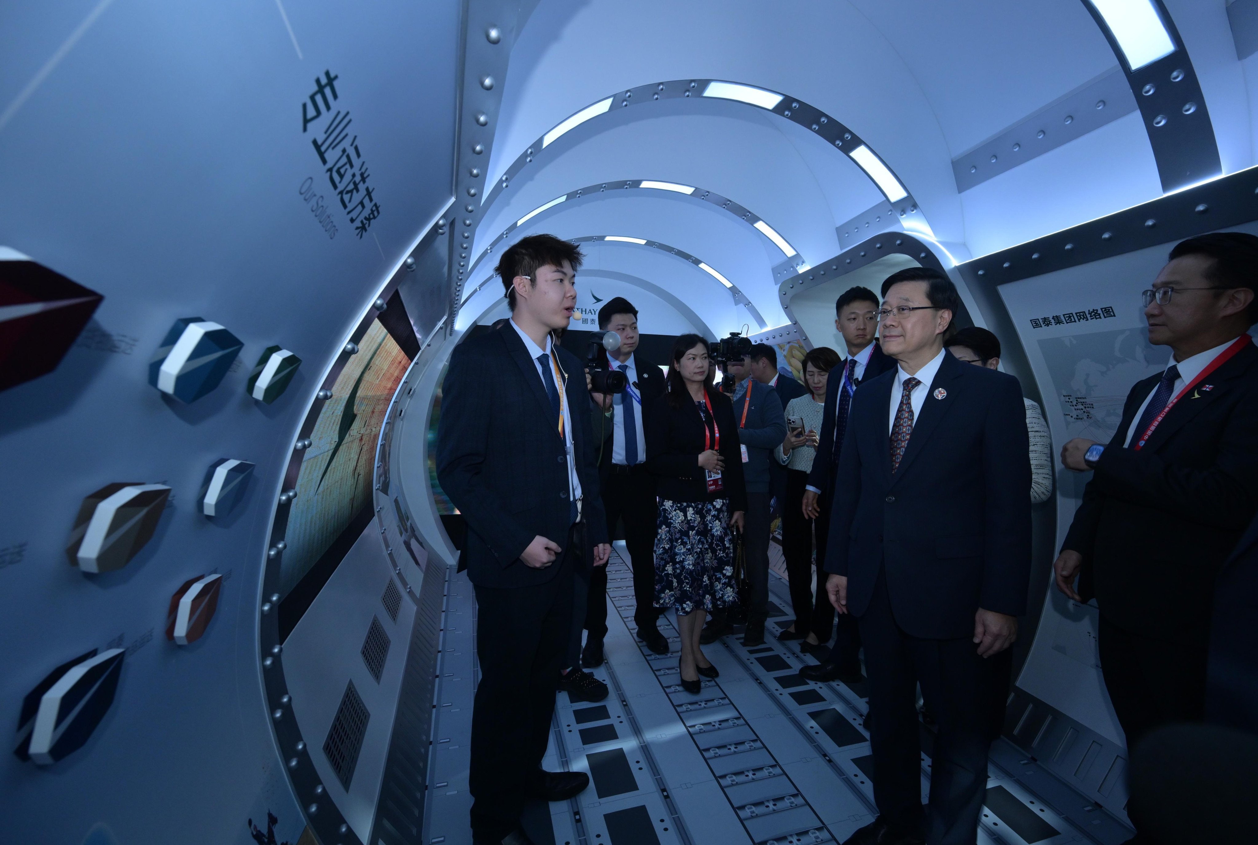Hong Kong Chief Executive John Lee Ka-chiu touring the 8th China International Import Expo in Shanghai on November 5. Photo: ISD
