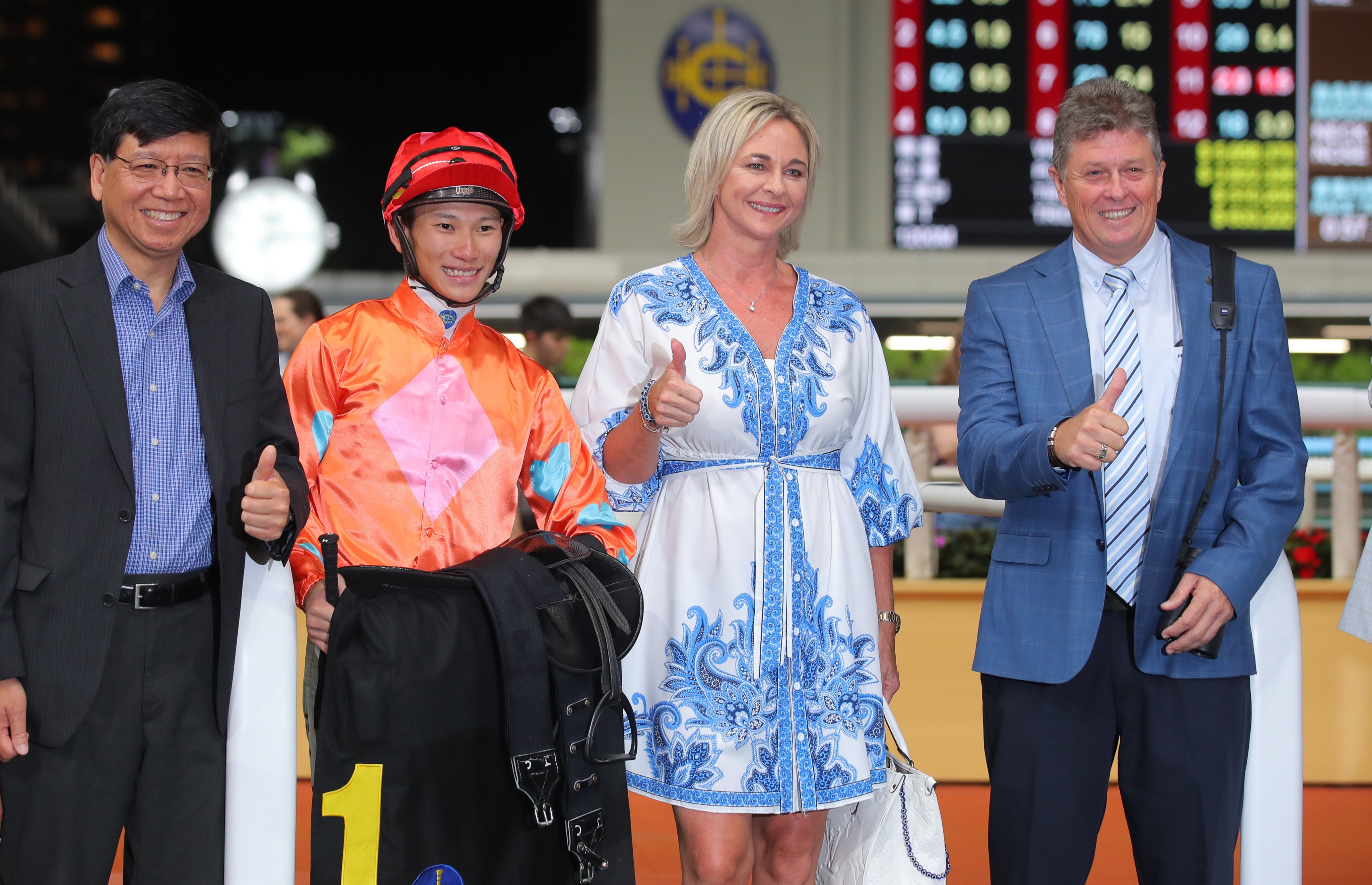 Trainer Brett Crawford (right) celebrates his first Happy Valley winner on Wednesday night. Photos: Kenneth Chan