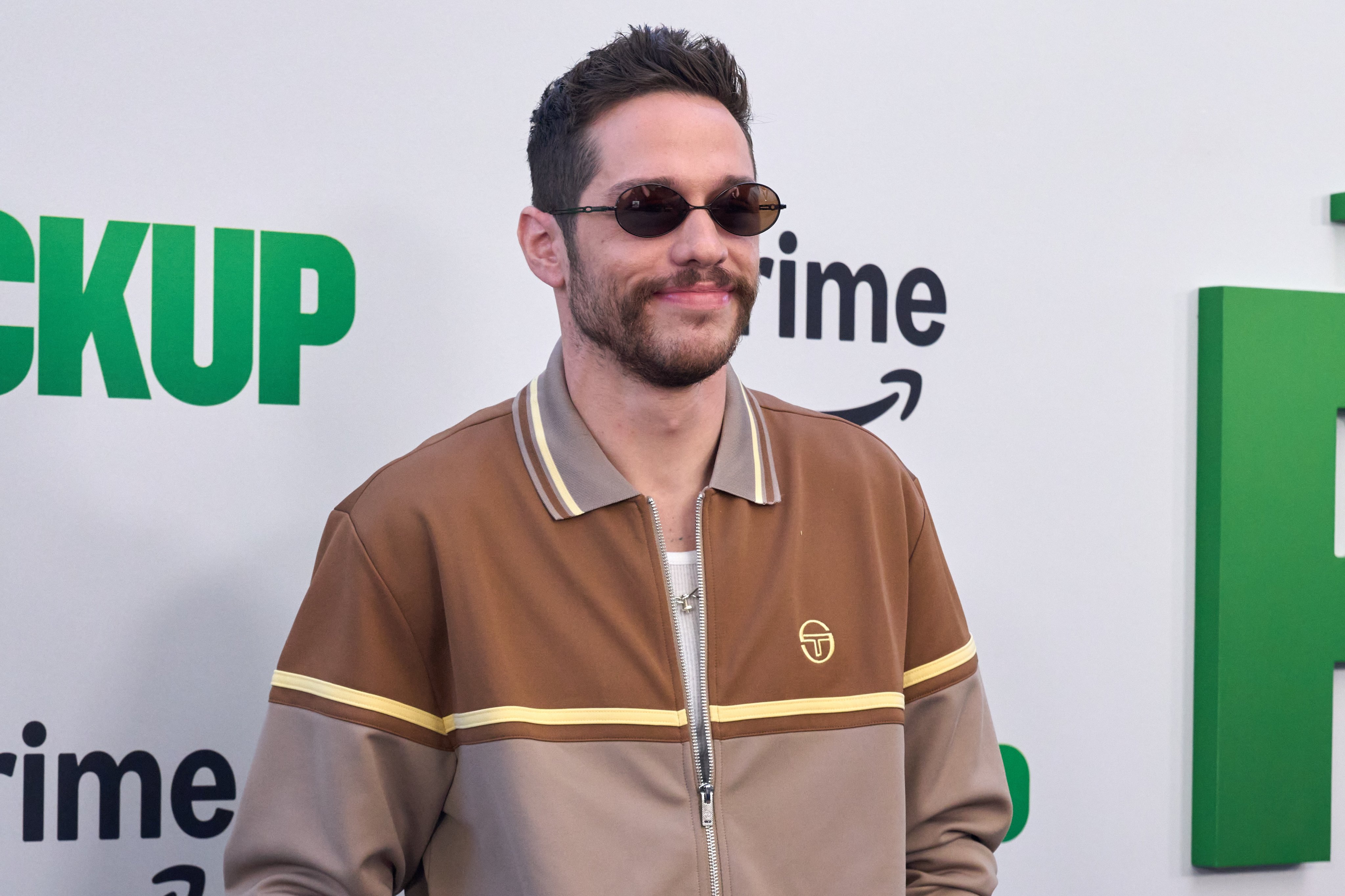 Pete Davidson wore a Sergio Tacchini tracksuit to the world premiere of The Pickup in Los Angeles, in July. Photo: EPA