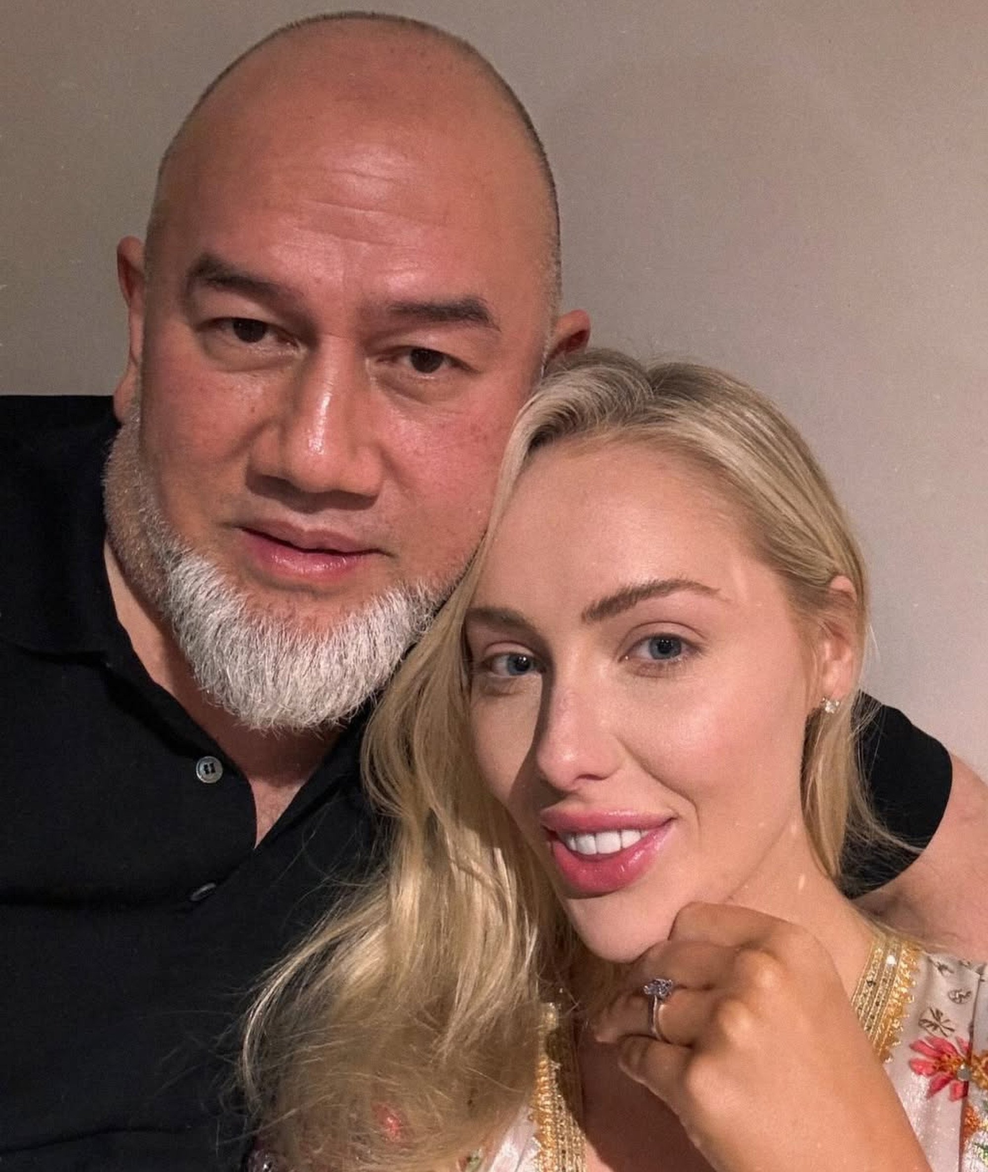 Brittany Porter and Sultan Muhammad V cosy up for a photo. Photo: Instagram/its.brook.lynn Brittany Porter and Sultan Muhammad V cosy up for a photo. Photo: Instagram/its.brook.lynn