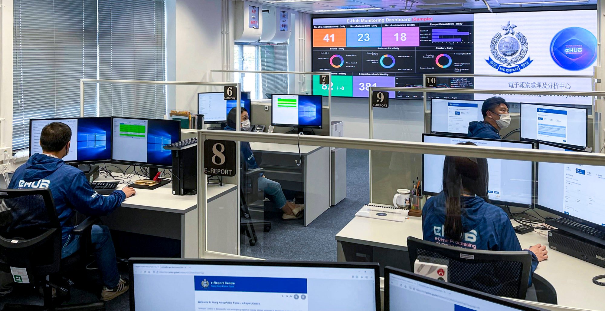 Hong Kong police officers manage an ungraded electronic report system, set up to combat a surge of cyber crimes and scams in recent years. Photo: Oscar Liu Hong Kong police officers manage an ungraded electronic report system, set up to combat a surge of cyber crimes and scams in recent years. Photo: Oscar Liu