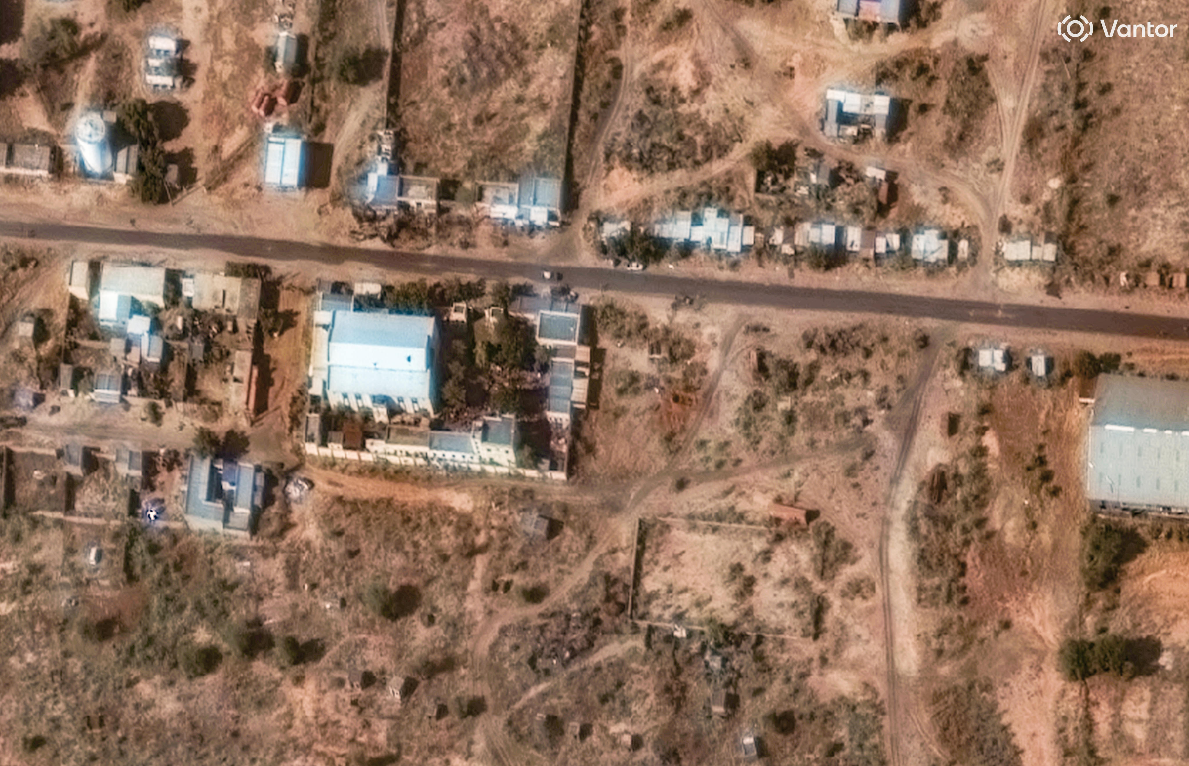 This satellite image shows a trench experts suspect of being a mass grave being dug near a former children’s hospital in El-Fasher, Sudan. Photo:  Vantor via AP