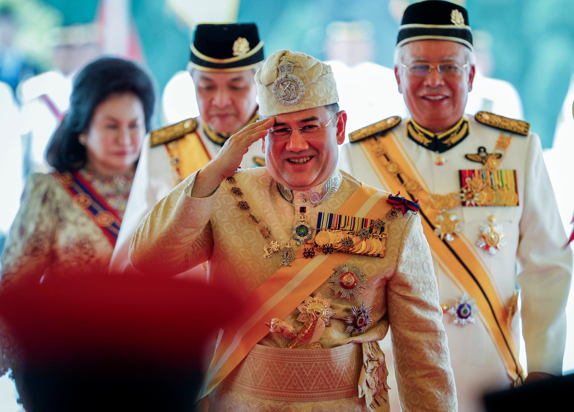 Sultan Muhammad V salutes after a welcoming ceremony to begin his term as king on December 13, 2016. Photo: AP Sultan Muhammad V salutes after a welcoming ceremony to begin his term as king on December 13, 2016. Photo: AP