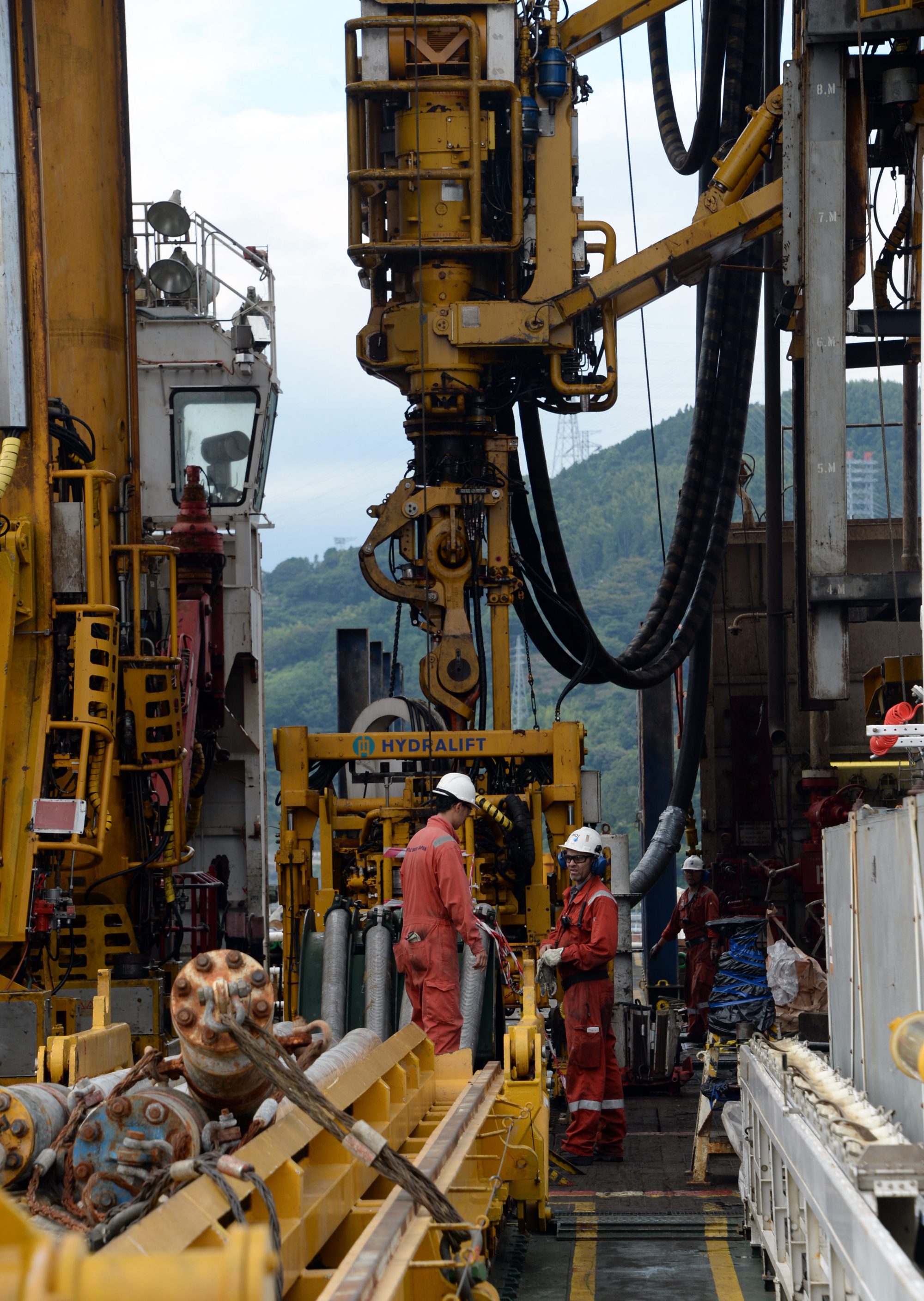 Workers check drilling machines on Japan’s deep-sea drilling vessel, Chikyu. Photo: AFP Workers check drilling machines on Japan’s deep-sea drilling vessel, Chikyu. Photo: AFP