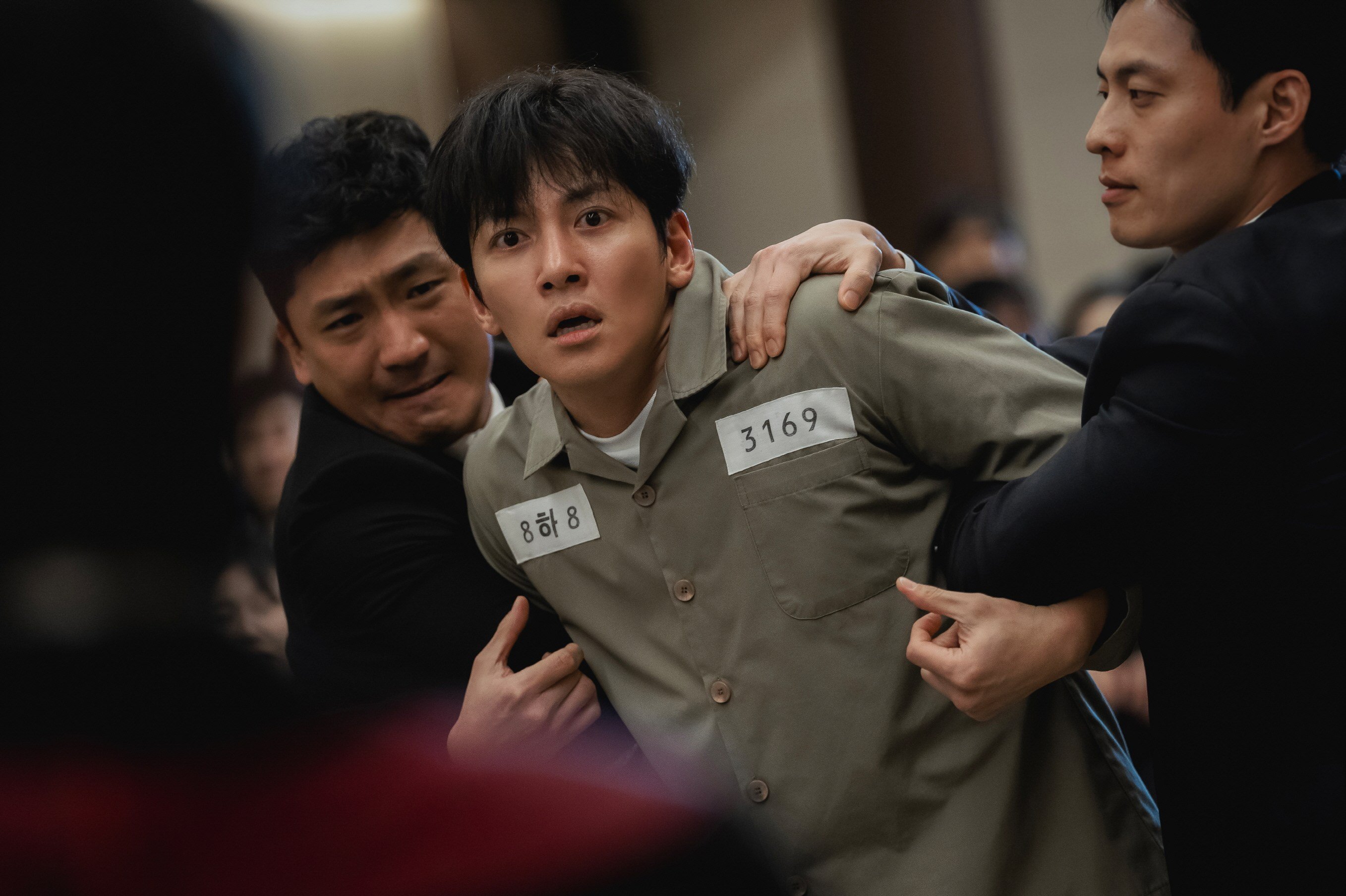 Ji Chang-wook (centre) as Park Tae-joong in a still from The Manipulated, a mile-a-minute action-revenge saga. Photo: Disney+