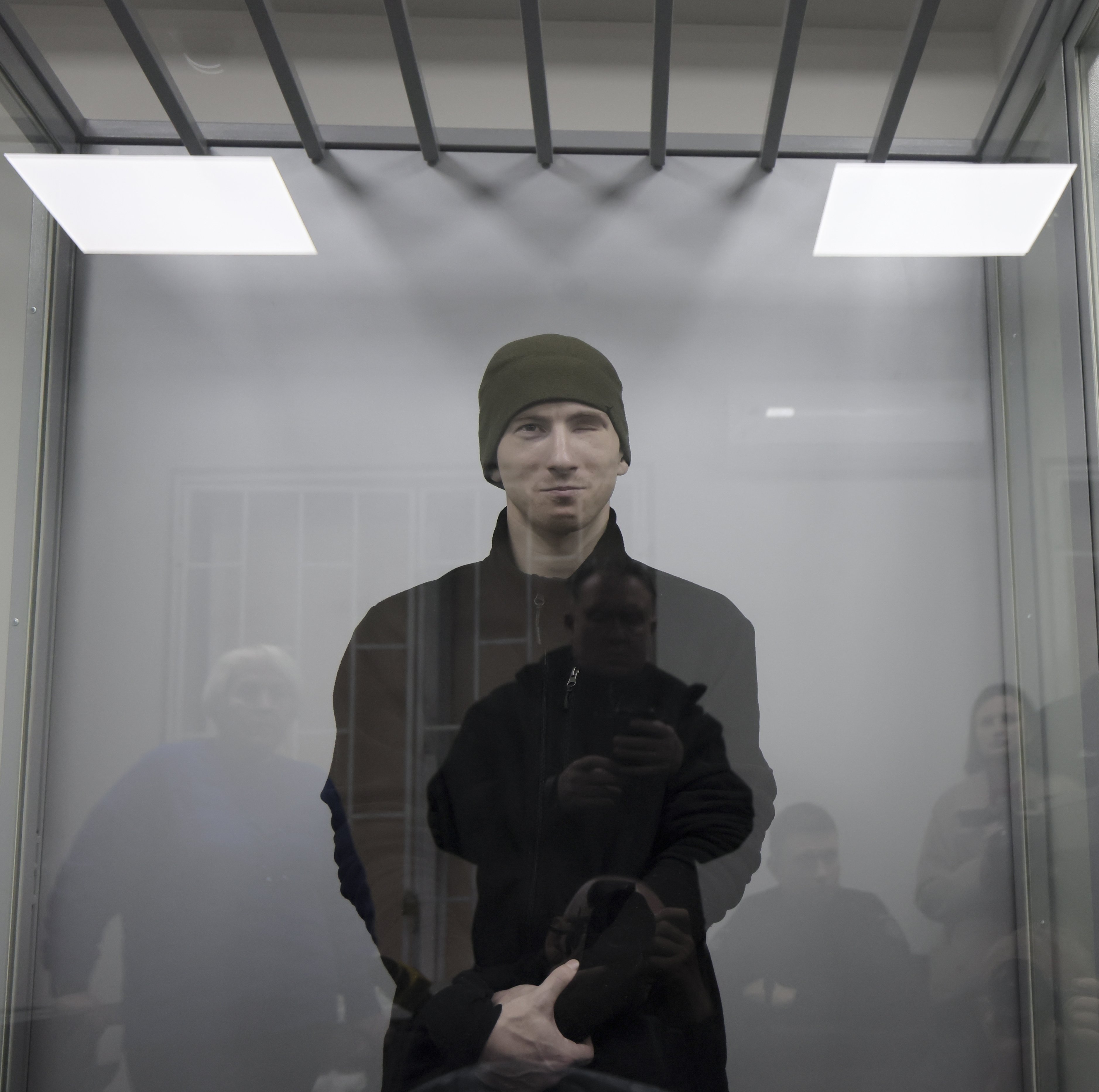 Captured Russian soldier Dmitry Kurashov attends a court hearing in the city of Zaporizhzhia, Ukraine, on Thursday. Photo: EPA