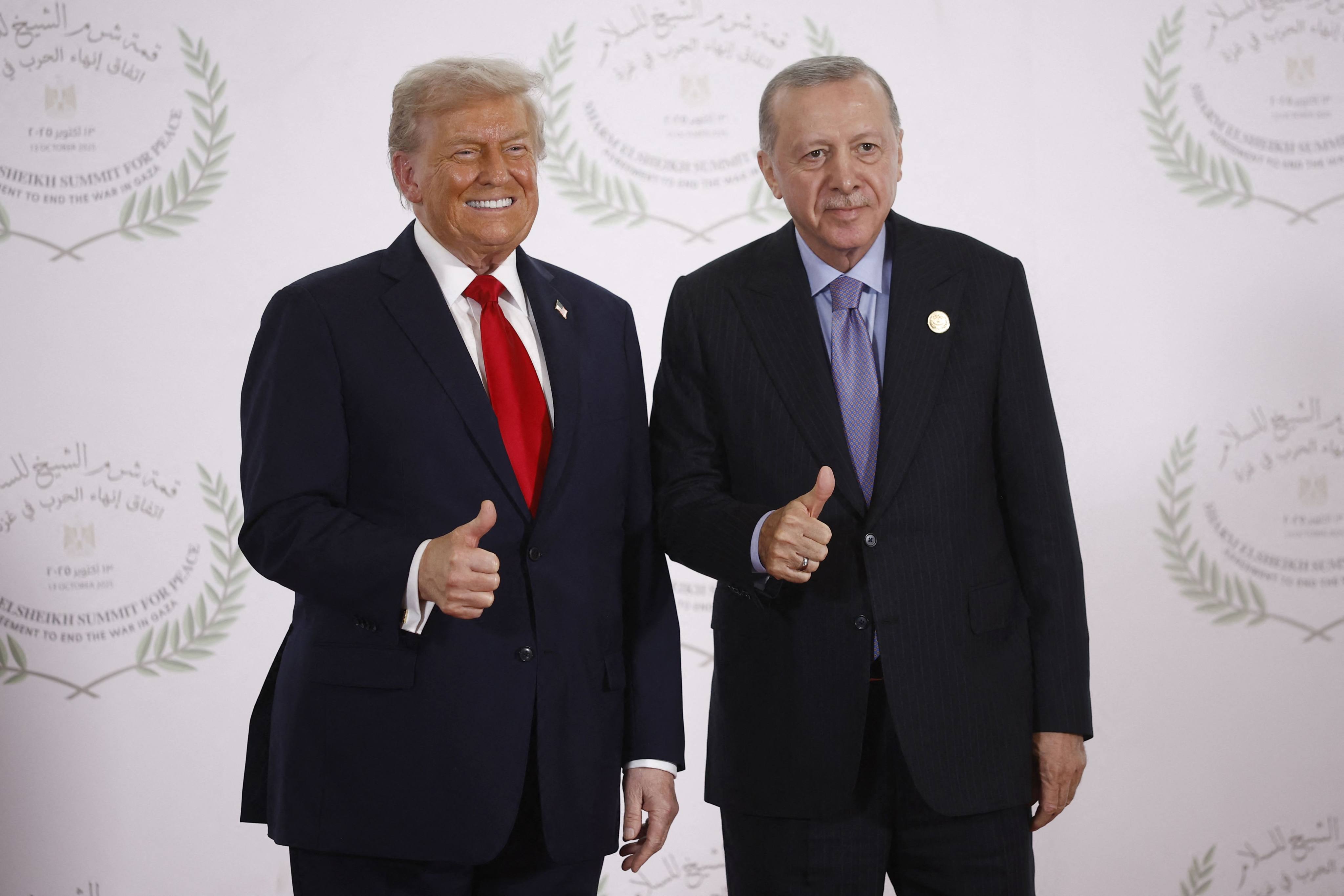 Turkey’s President Recep Tayyip Erdogan and US President Donald Trump give a thumbs up at the Gaza Peace Summit in Sharm El-Sheikh, Egypt, on October 13. Photo: AFP