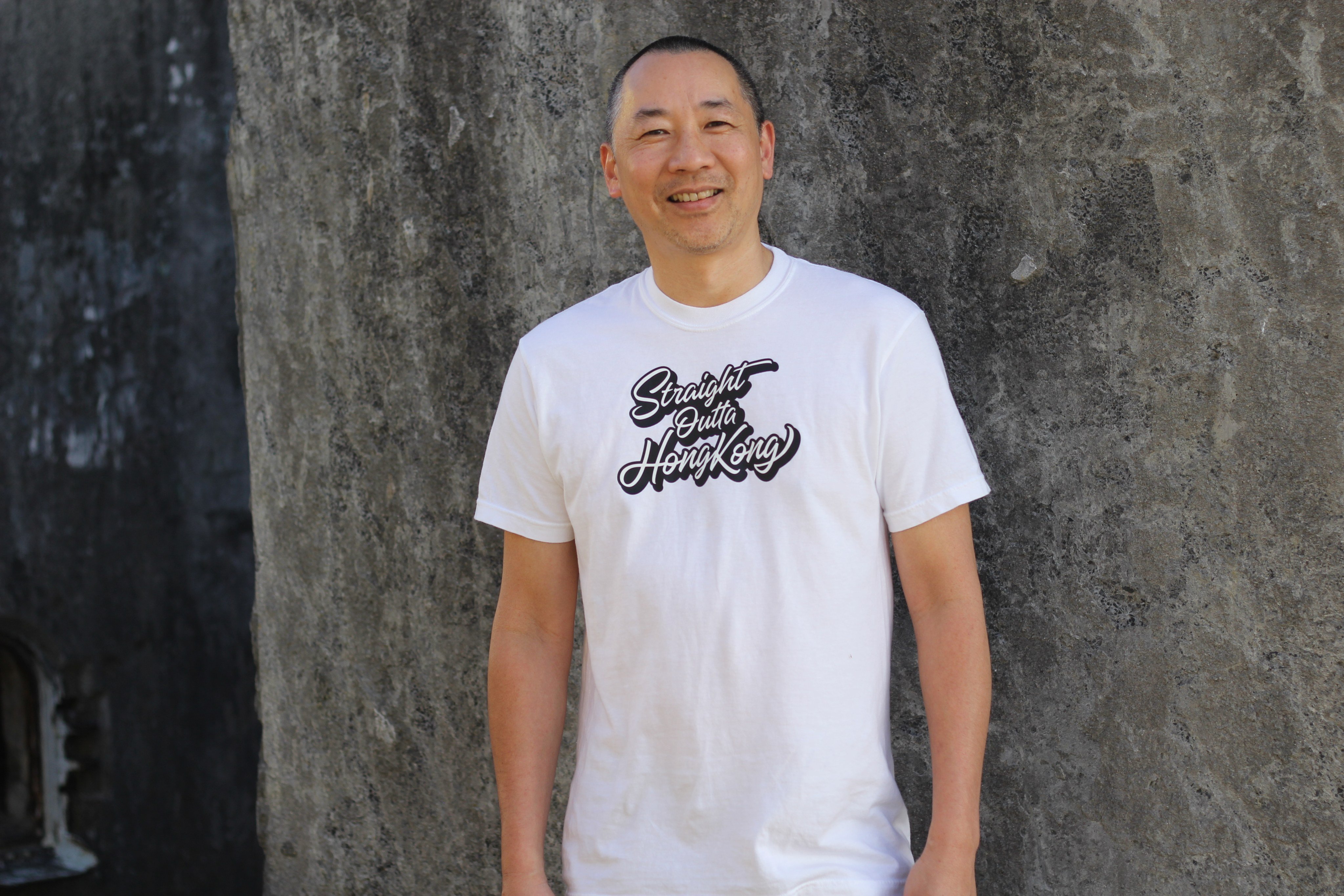Ant Sang, a fifth-generation Chinese-New Zealander, wears one of his Cantotees t-shirts. Photo: Delia Sang