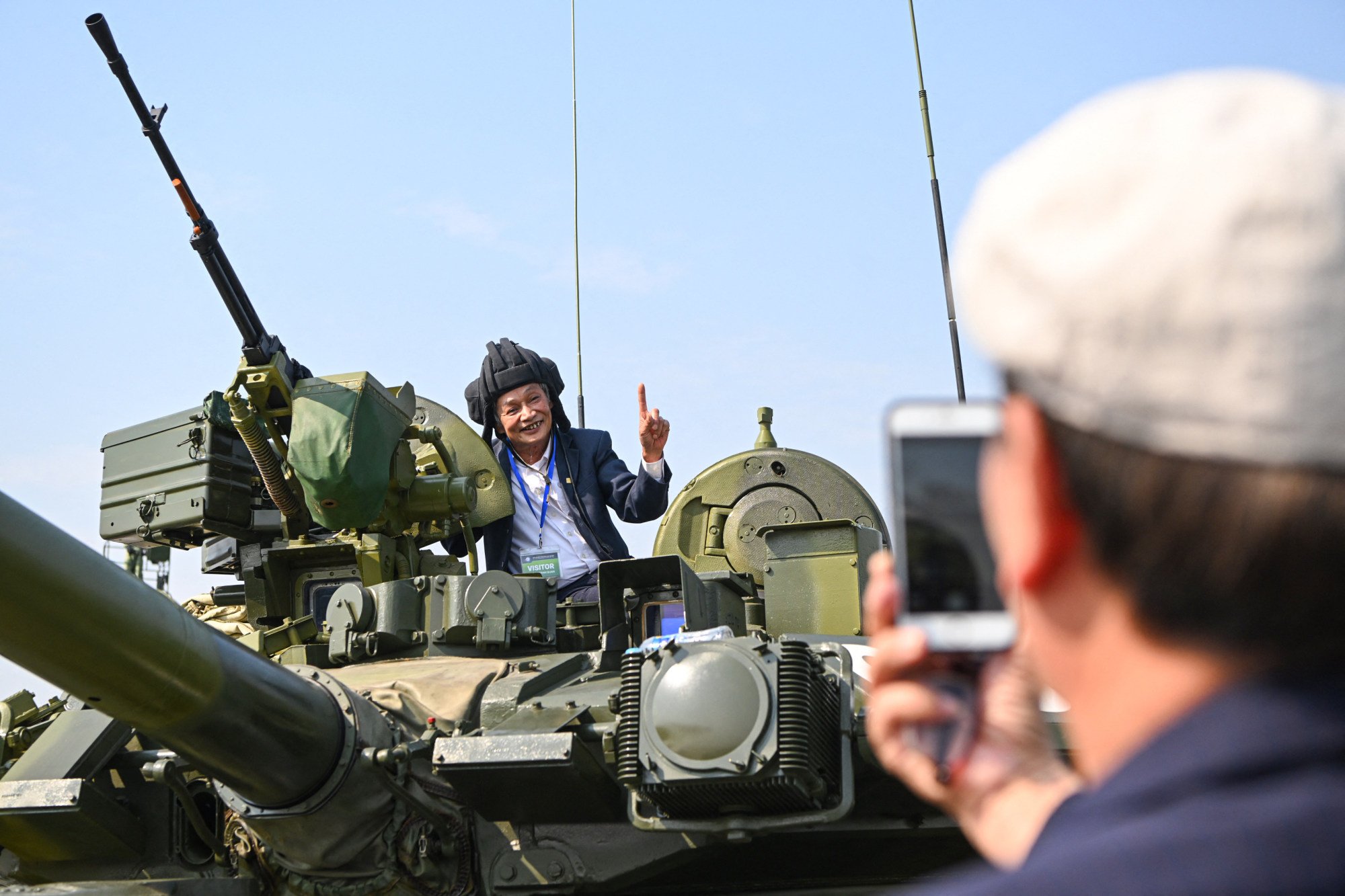 A man poses for photo on the turret of a Russian T-90A tank during the Vietnam 2024 International Defence Expo in Hanoi last year. Photo: AFP A man poses for photo on the turret of a Russian T-90A tank during the Vietnam 2024 International Defence Expo in Hanoi last year. Photo: AFP