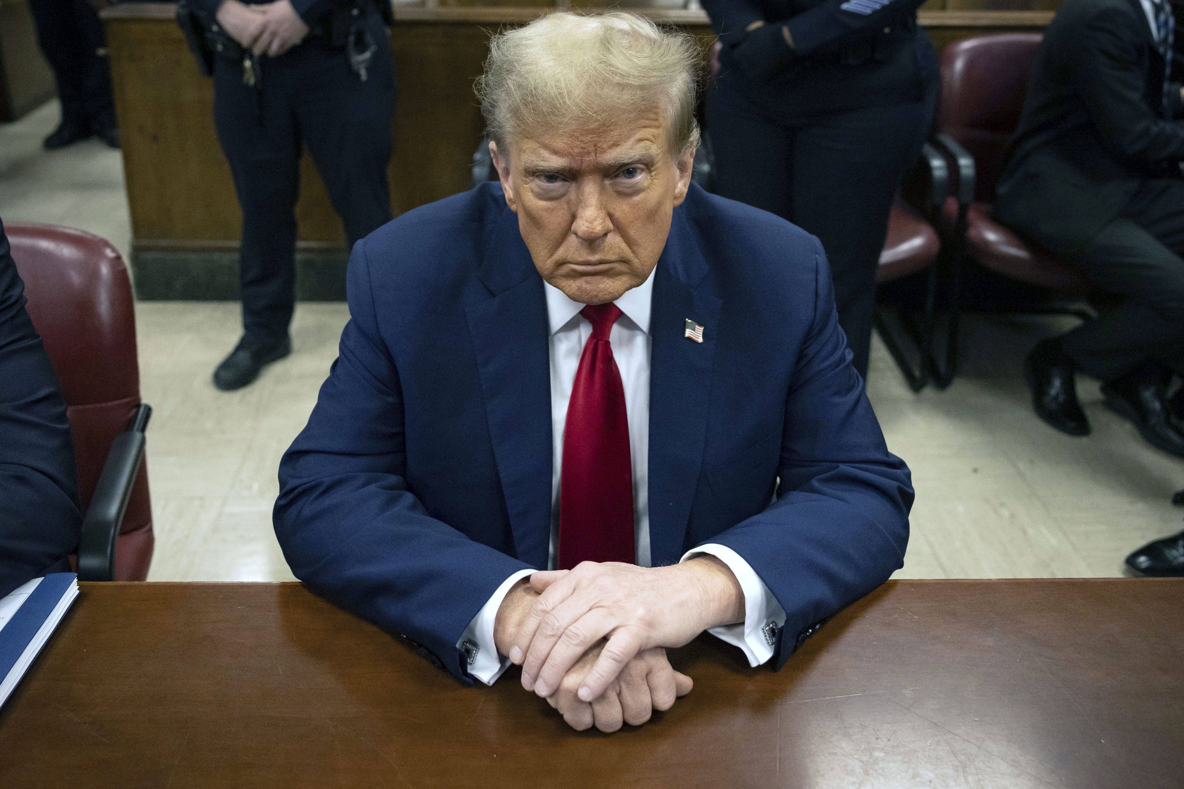 Donald Trump waits for the start of proceedings in Manhattan criminal court in New York in April 2024. Photo: AP