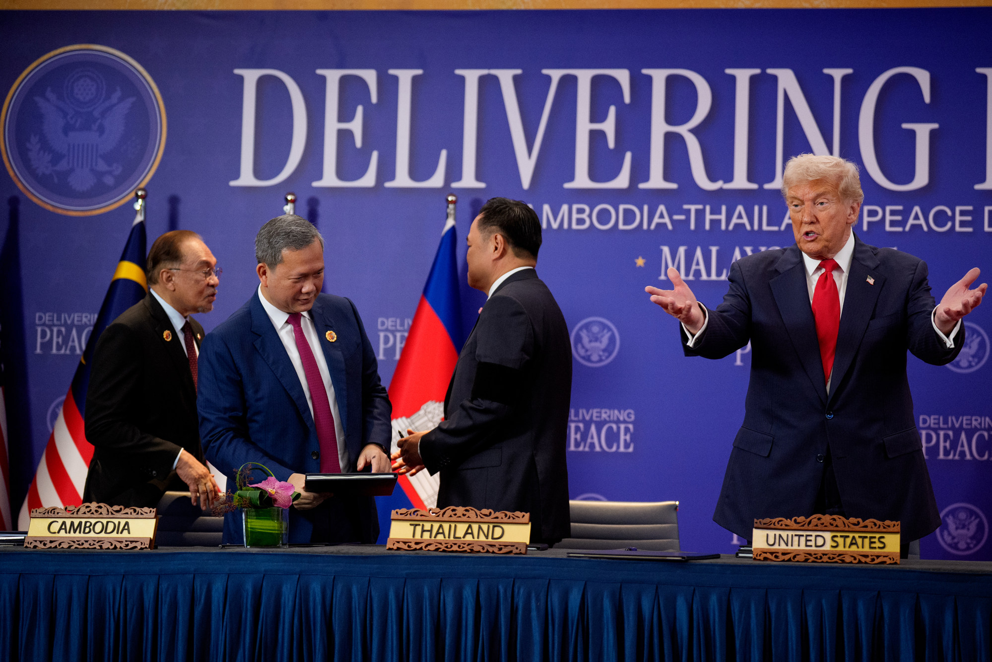 US President Donald Trump (right) speaks after presiding over the signing of a Cambodia-Thailand peace deal as (from the left) Malaysian Prime Minister Anwar Ibrahim, Cambodian Prime Minister Hun Manet and Thai Prime Minister Anutin Charnvirakul talk together at the Kuala Lumpur Convention Centre on October 26 in Malaysia. Photo: Getty Images/TNS US President Donald Trump (right) speaks after presiding over the signing of a Cambodia-Thailand peace deal as (from the left) Malaysian Prime Minister Anwar Ibrahim, Cambodian Prime Minister Hun Manet and Thai Prime Minister Anutin Charnvirakul talk together at the Kuala Lumpur Convention Centre on October 26 in Malaysia. Photo: Getty Images/TNS