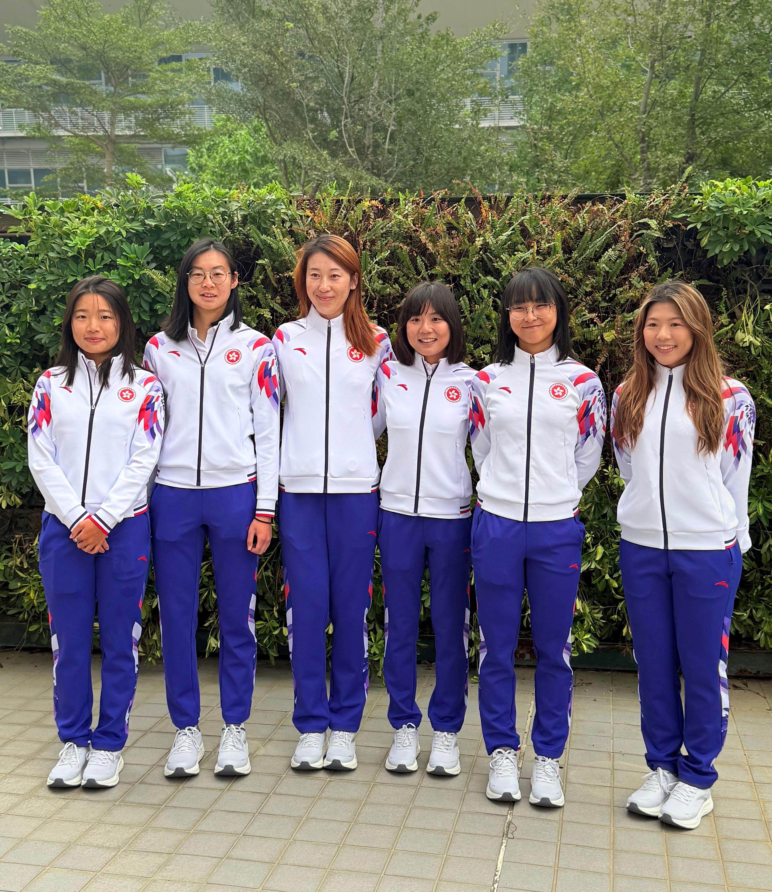 Ceci Lee (second from right) with her Hong Kong road race teammates after their arrival in Zhuhai on Wednesday. Photo: CAHKC