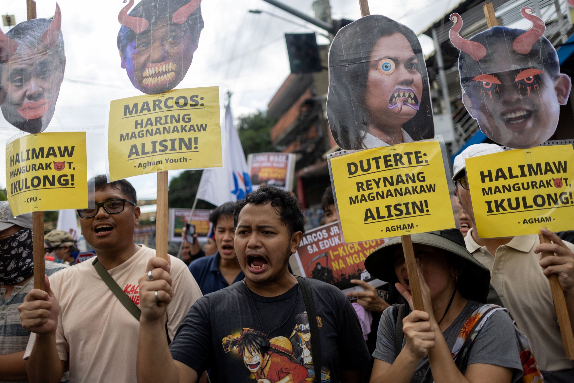Filipino activists hold props depicting President Ferdinand Marcos Jnr and Vice-President Sara Duterte-Carpio as monsters during a protest against government corruption in Manila on October 31. Photo: Reuters Filipino activists hold props depicting President Ferdinand Marcos Jnr and Vice-President Sara Duterte-Carpio as monsters during a protest against government corruption in Manila on October 31. Photo: Reuters