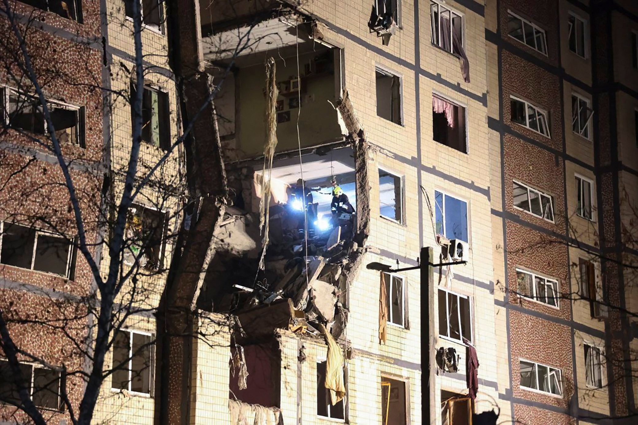 Ukrainian rescuers work at the site of a Russian strike on a residential building in Dnipro on Saturday. Photo: Dnipropetrovsk Regional State Administration/EPA