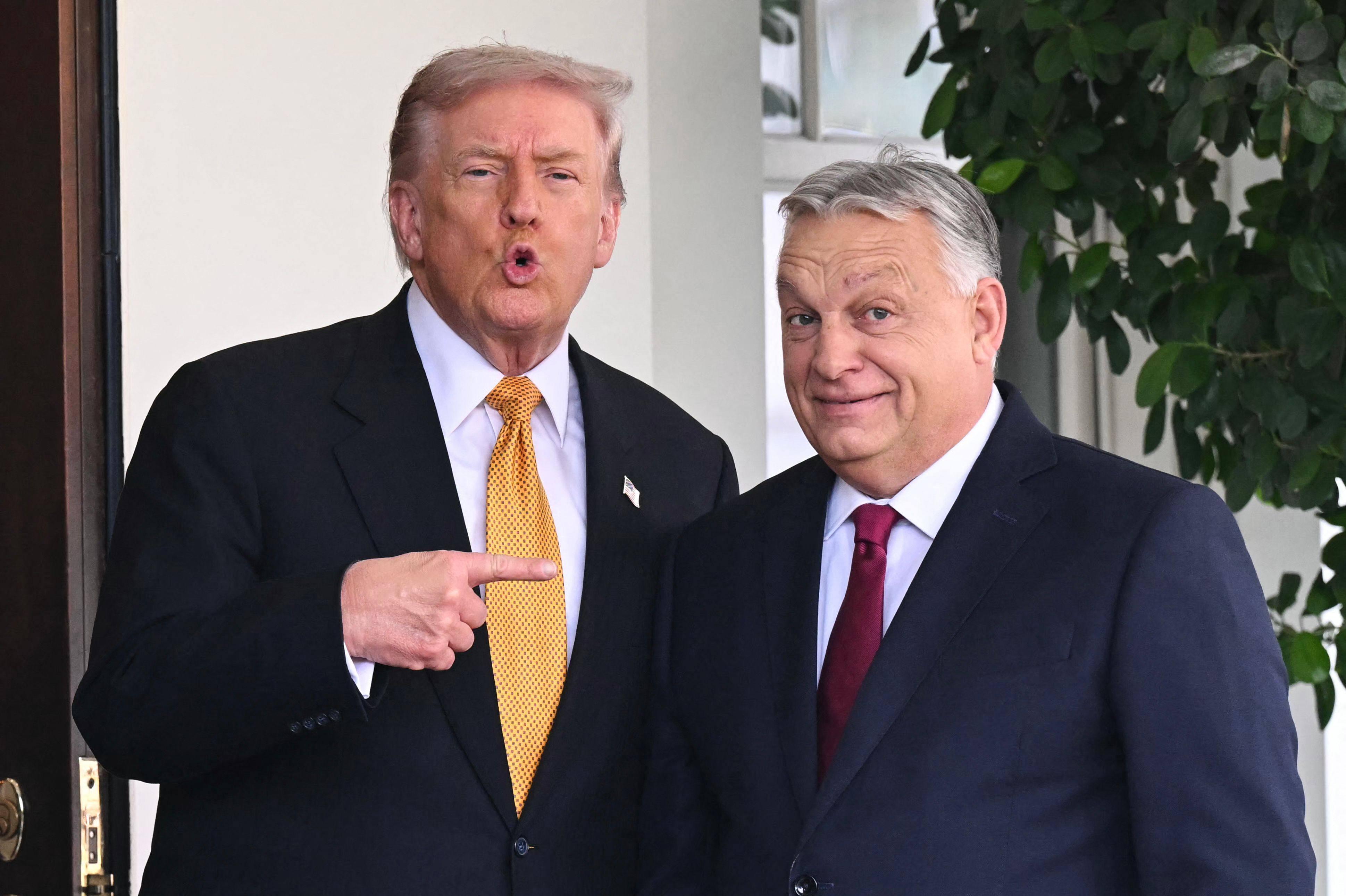 US President Donald Trump (left) greets Hungarian Prime Minister Viktor Orban outside the West Wing of the White House on Friday. Photo: AFP