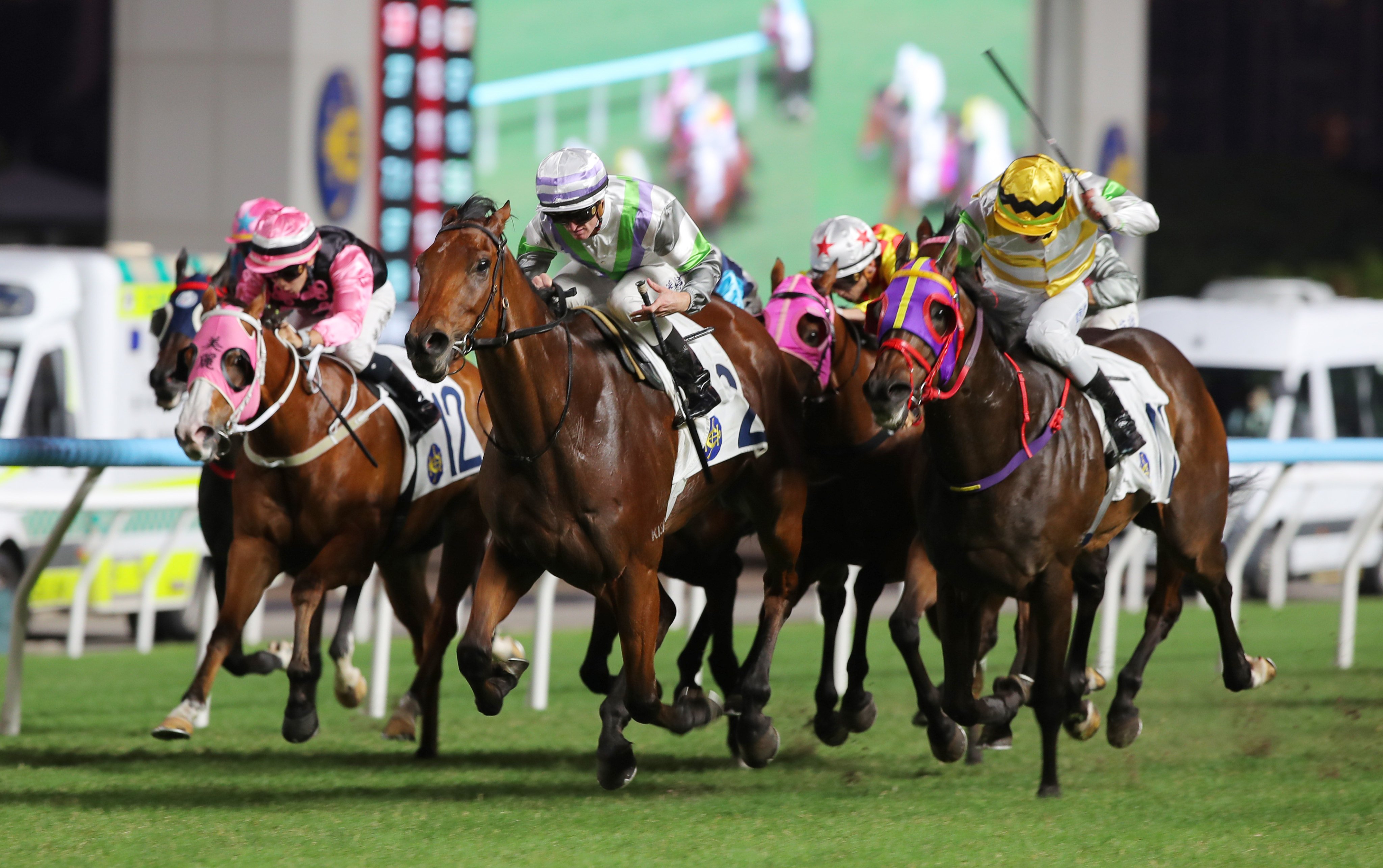 Light Years Charm (centre) salutes at Sha Tin on Sunday. Photos: Kenneth Chan