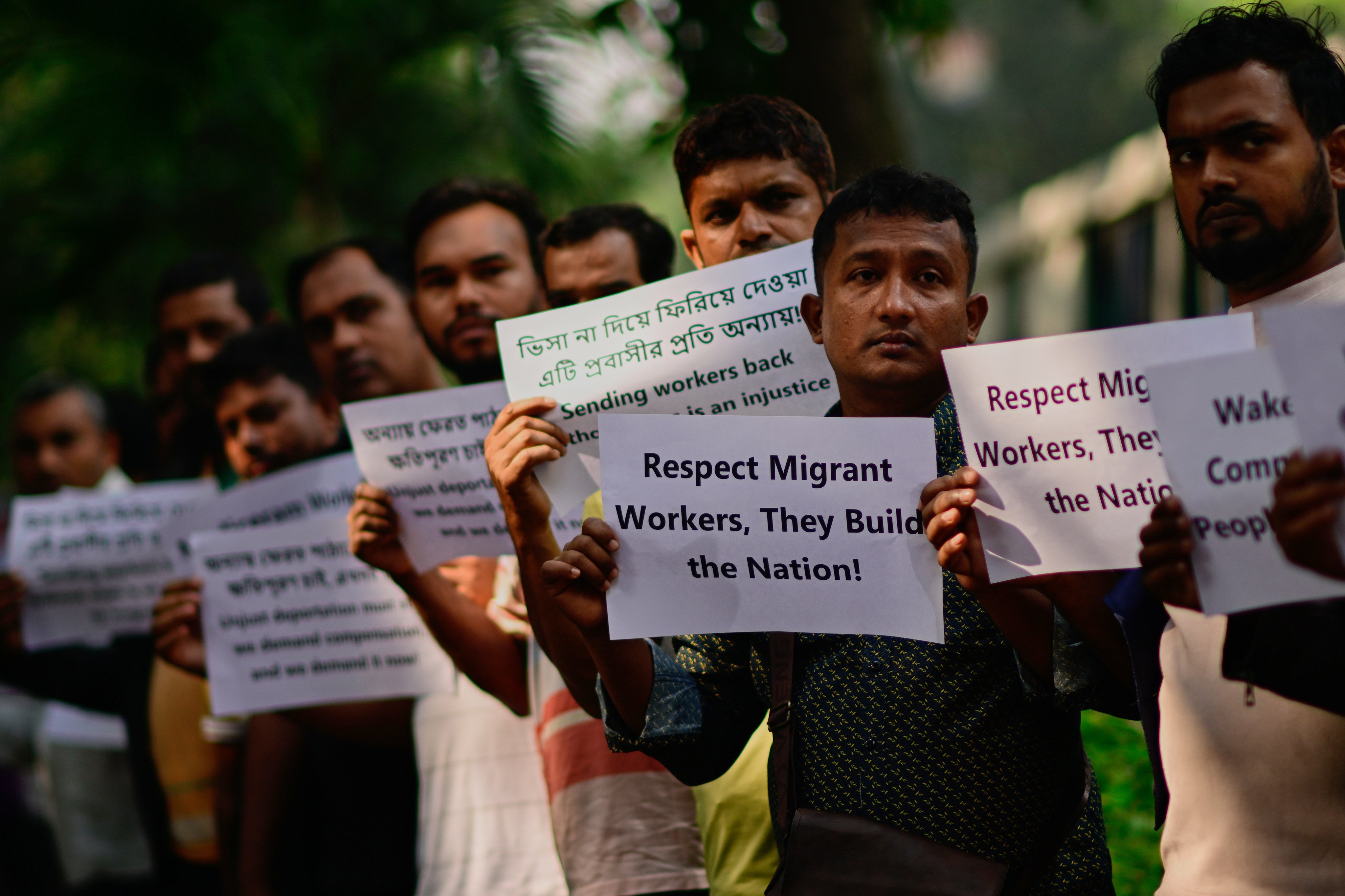 Bangladeshi workers who were employed by Malaysian companies protest in front of the Ministry of Expatriates’ Welfare and Overseas Employment in Dhaka, Bangladesh on Monday. Photo: AP