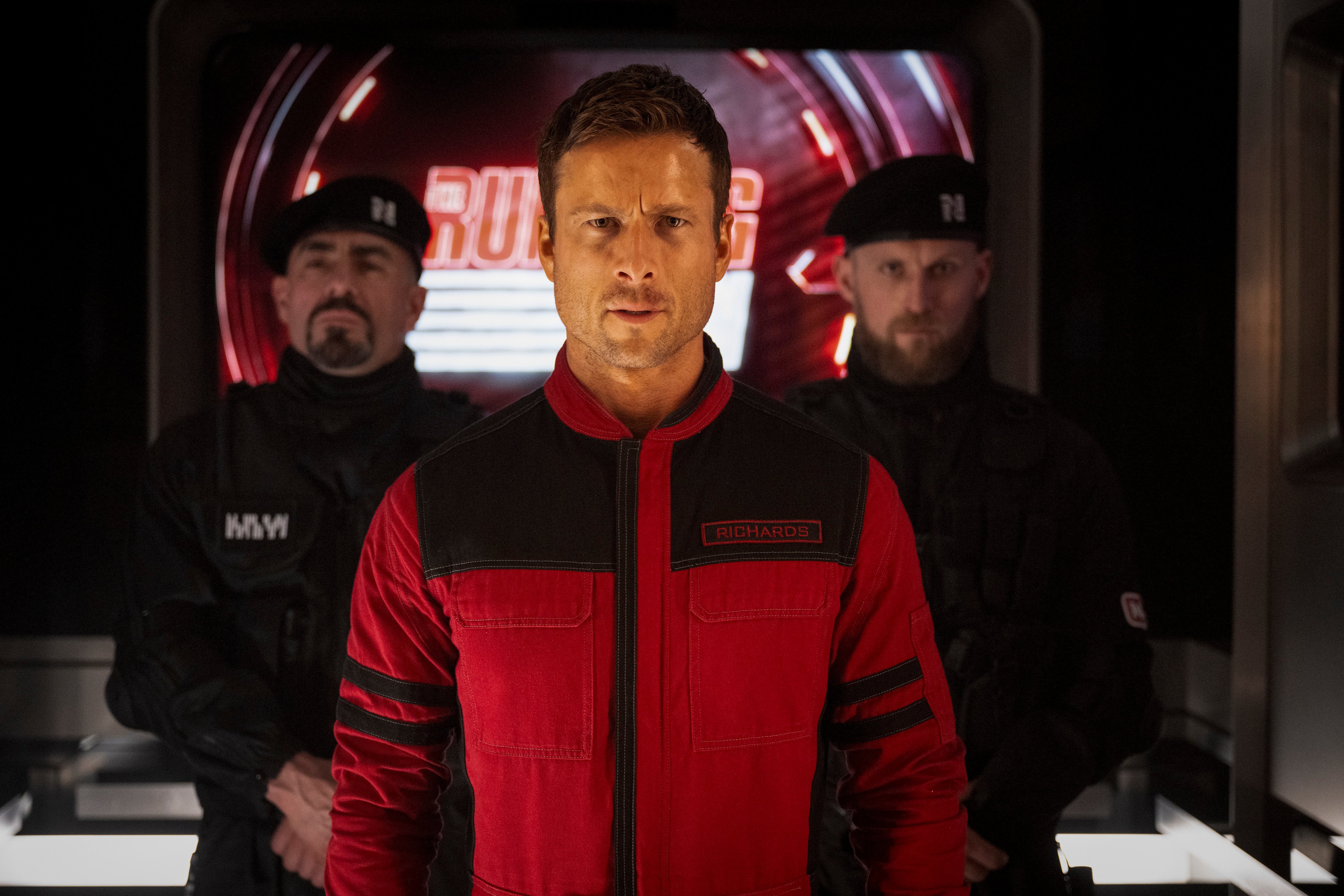 Glen Powell (centre) in a still from The Running Man. Stephen King and Edgar Wright talk about the original novel, the 1987 film and its latest iteration. Photo: Paramount Pictures