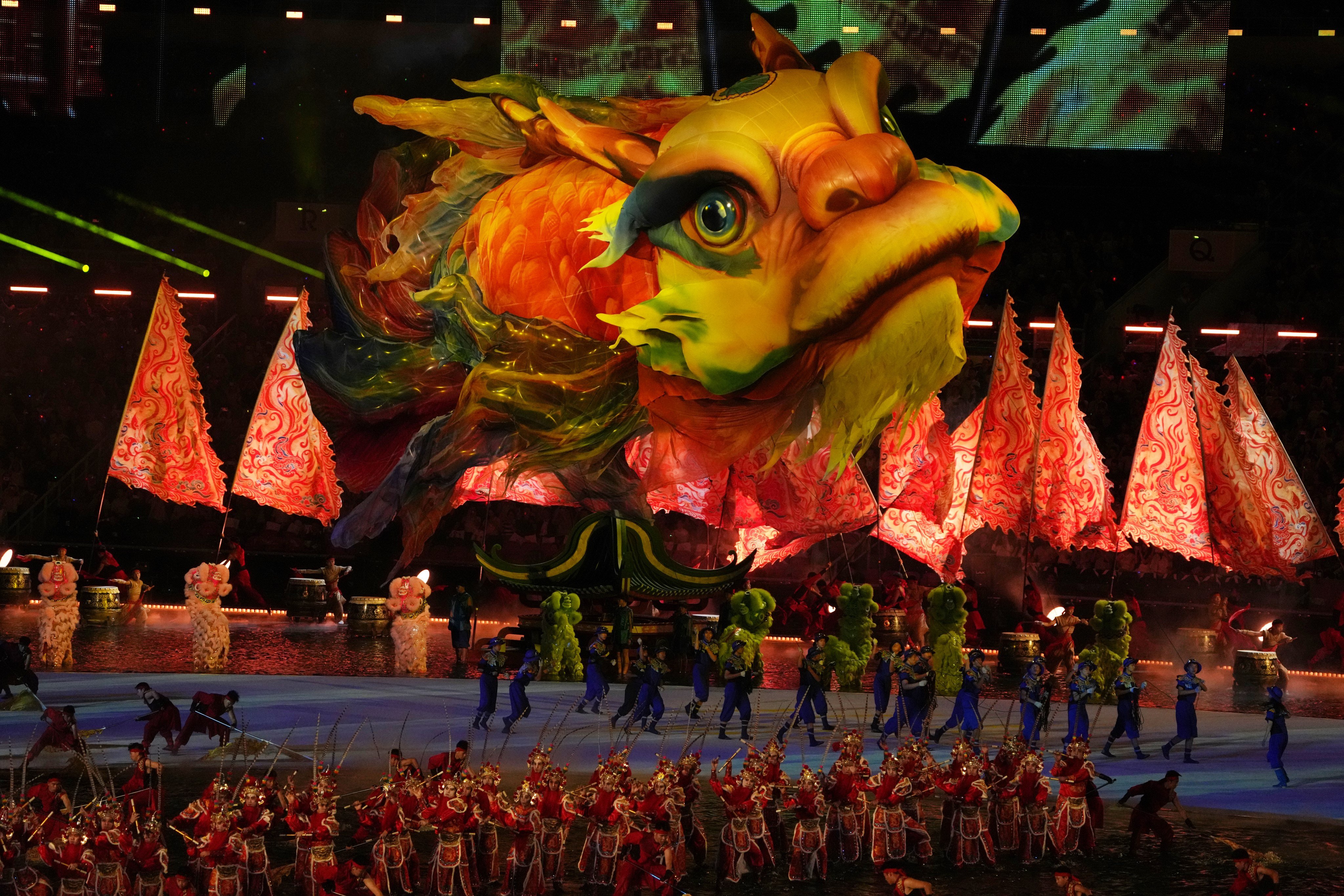 The popular fish at the opening ceremony held at Guangdong Olympic Stadium was manipulated by a group of around 20 puppeteers on the ground. Photo: Elson Li
