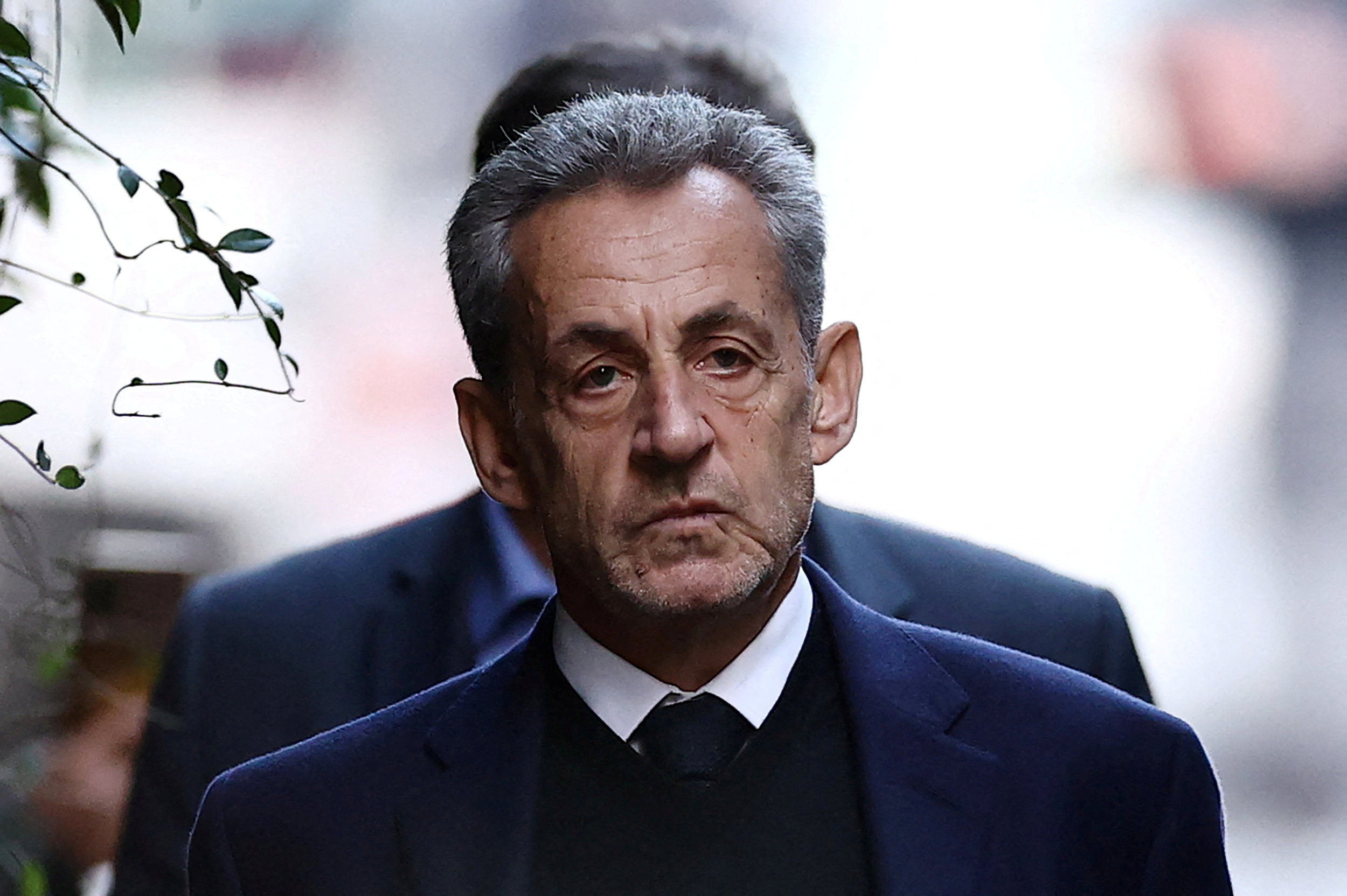 Former French president Nicolas Sarkozy leaves his house on October 21, to begin his five-year prison sentence. Photo: Reuters