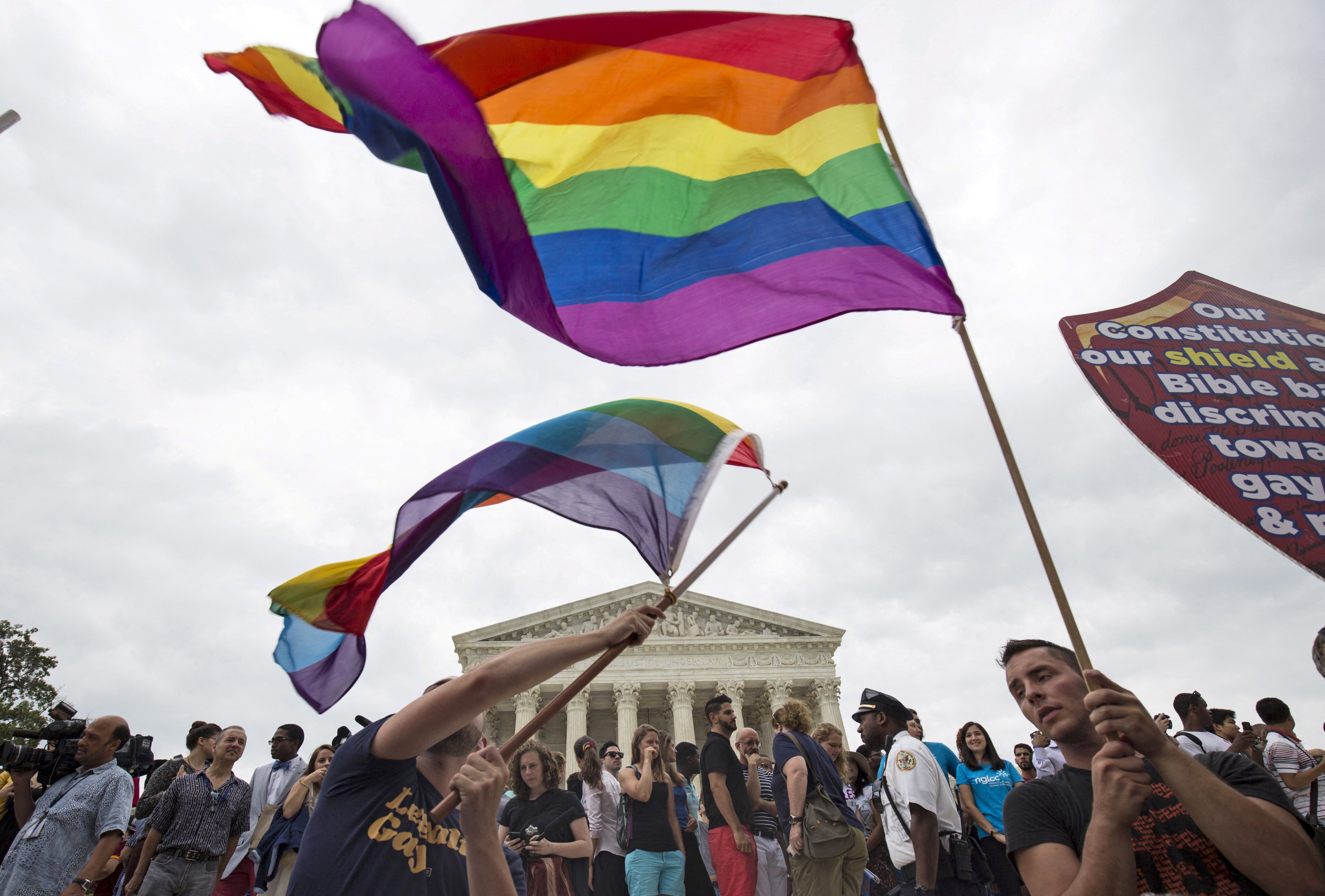 Supporters of gay marriage wave the rainbow flag outside the Supreme Court in Washington in 2015 after it ruled the U.S. Constitution provides same-sex couples the right to marry. Photo: Reuters