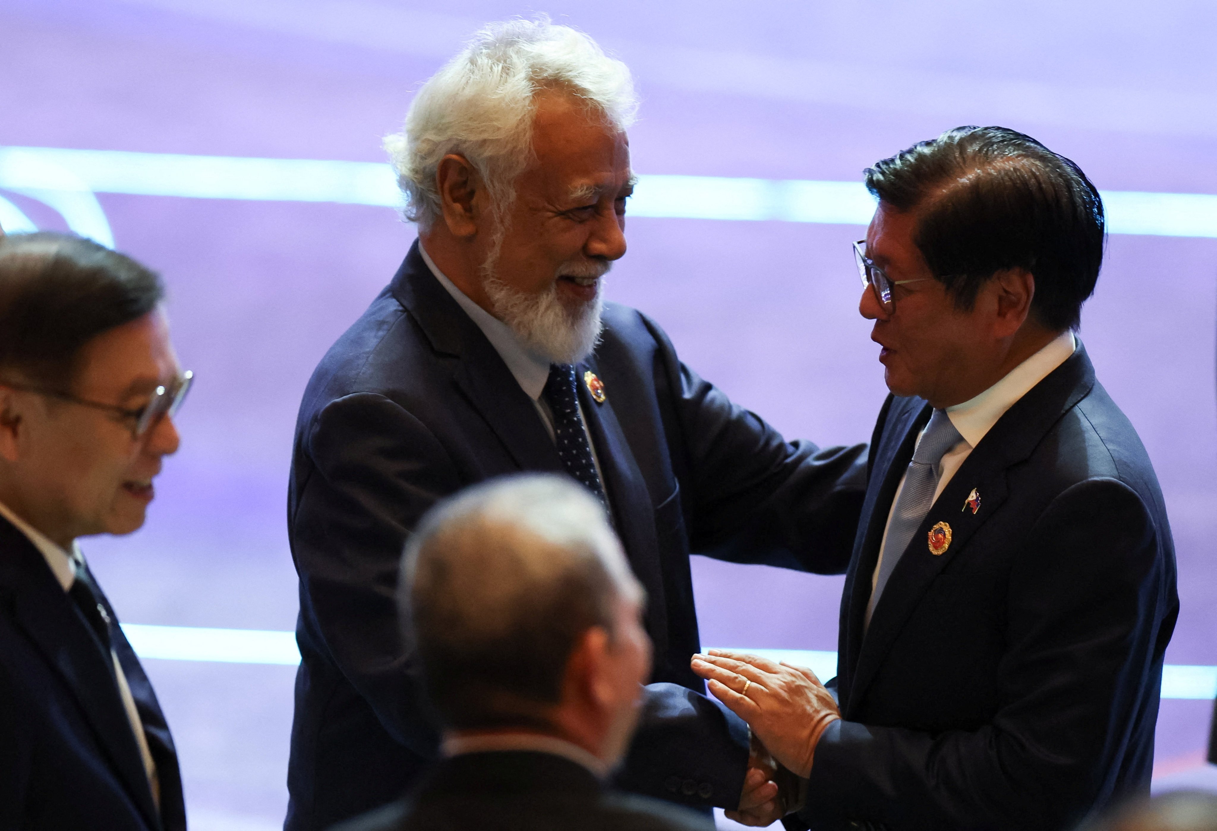 East Timor Prime Minister Kay Rala Xanana Gusmao shakes hands with Philippine President Ferdinand Marcos Jnr at the Asean summit on October 28. Photo: Reuters