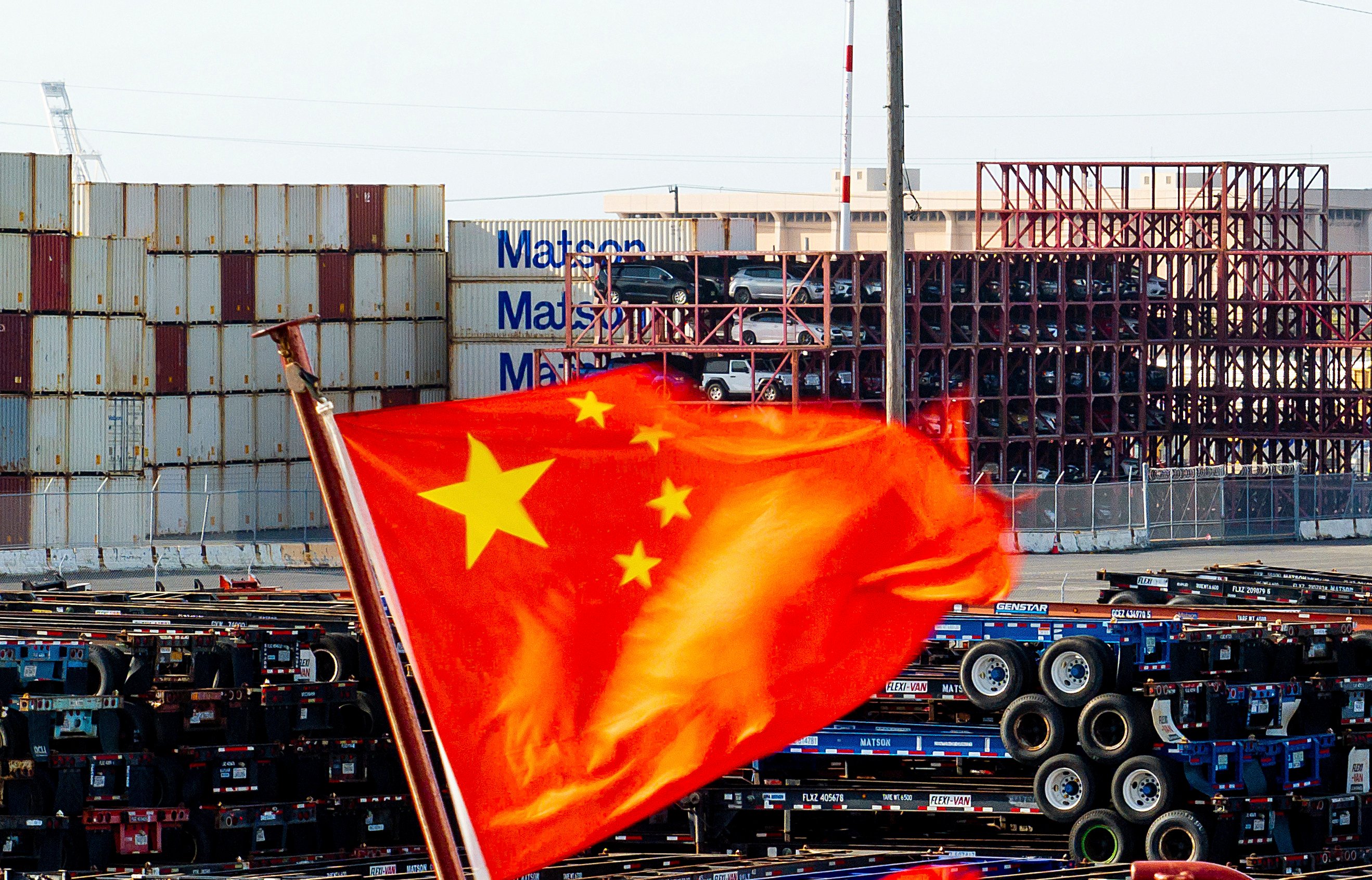 A Chinese flag flies from a ship at the Port of Oakland in the US state of California in April. Photo: AP