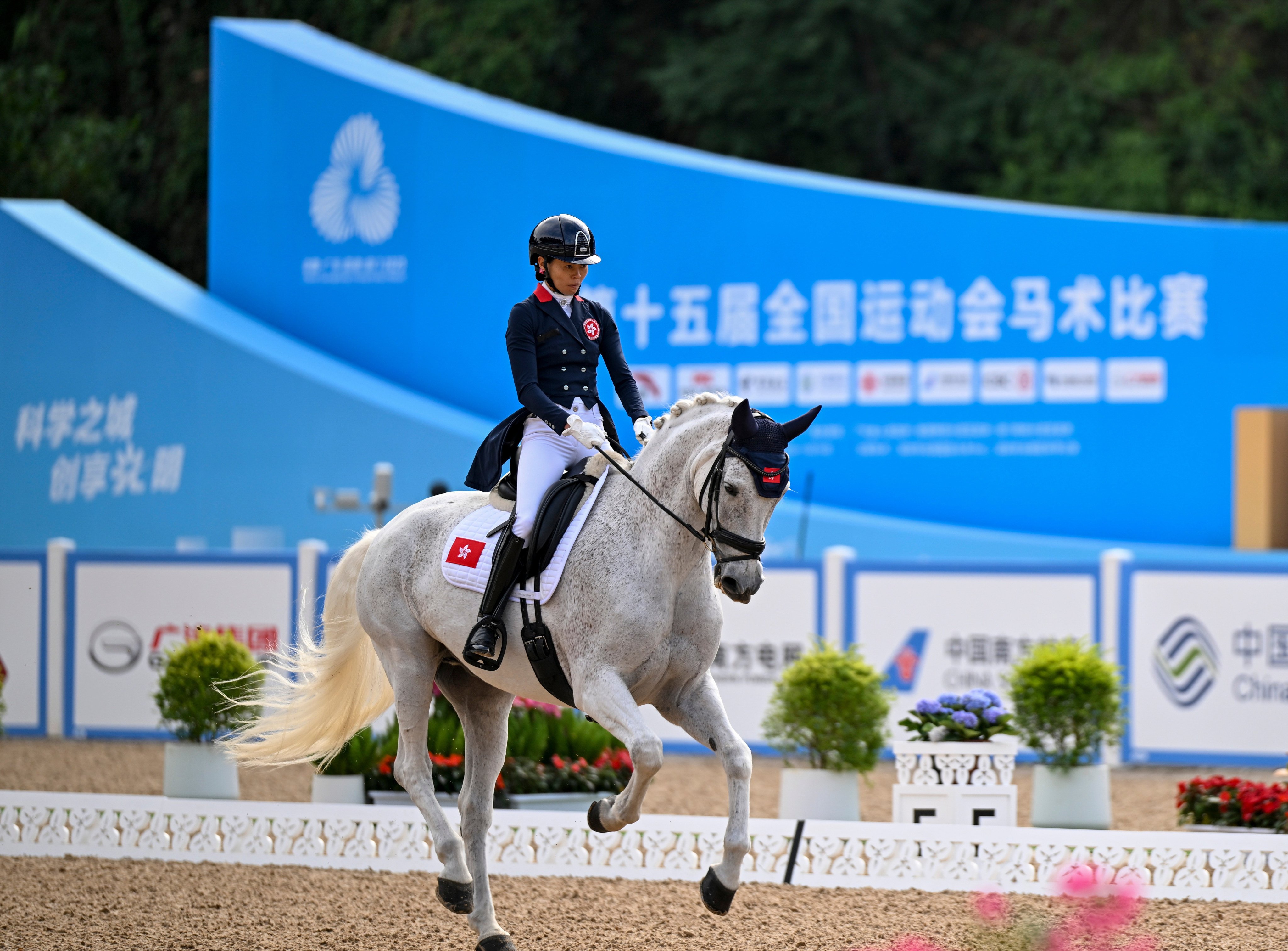 Hong Kong’s Annie Ho and her horse, Lord Sandro K, finished seventh in the individual dressage final. Photo: Xinhua
