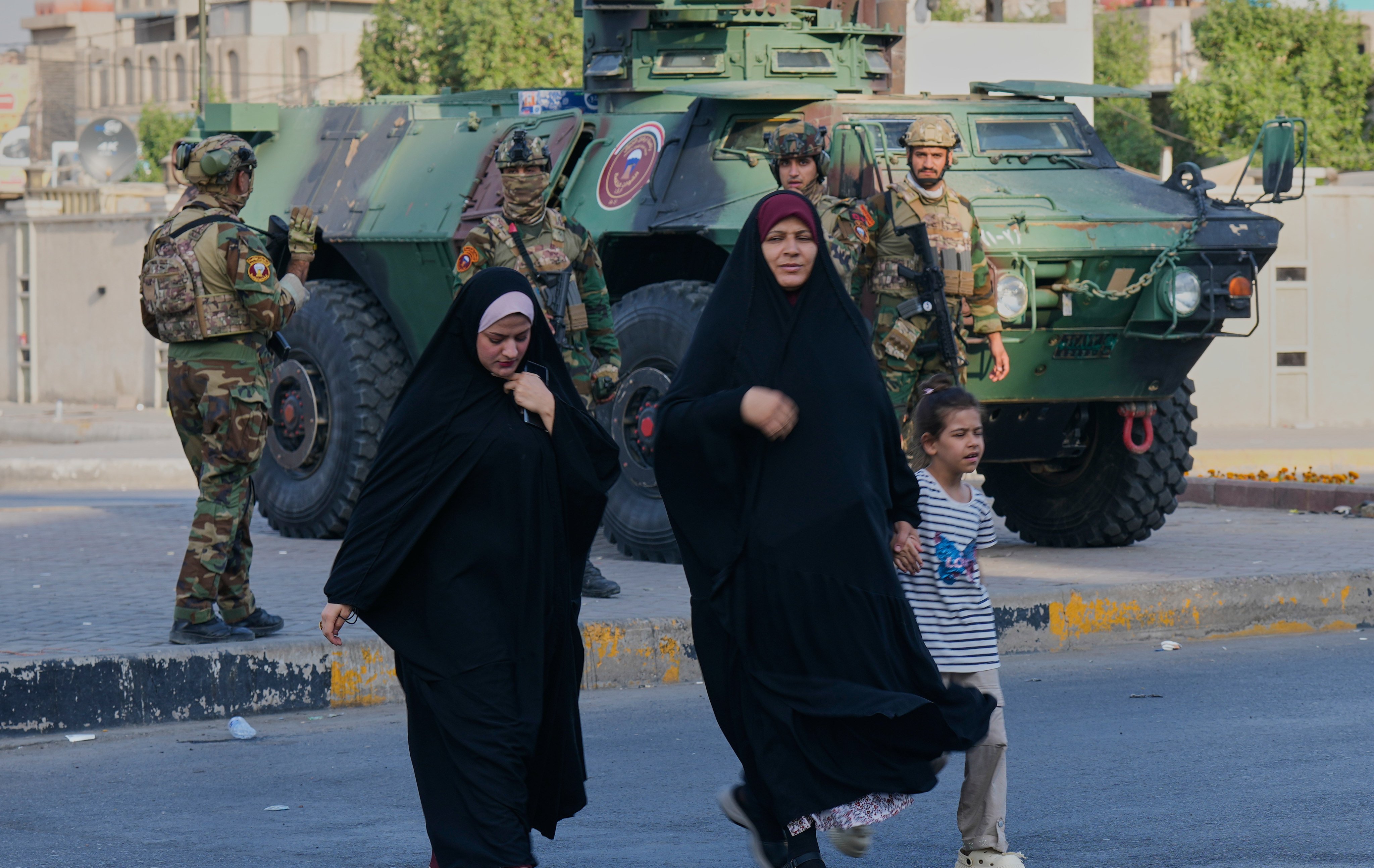 Iraqi soldiers patrol Sadr City, Baghdad, during parliamentary elections on Tuesday. Photo: AP