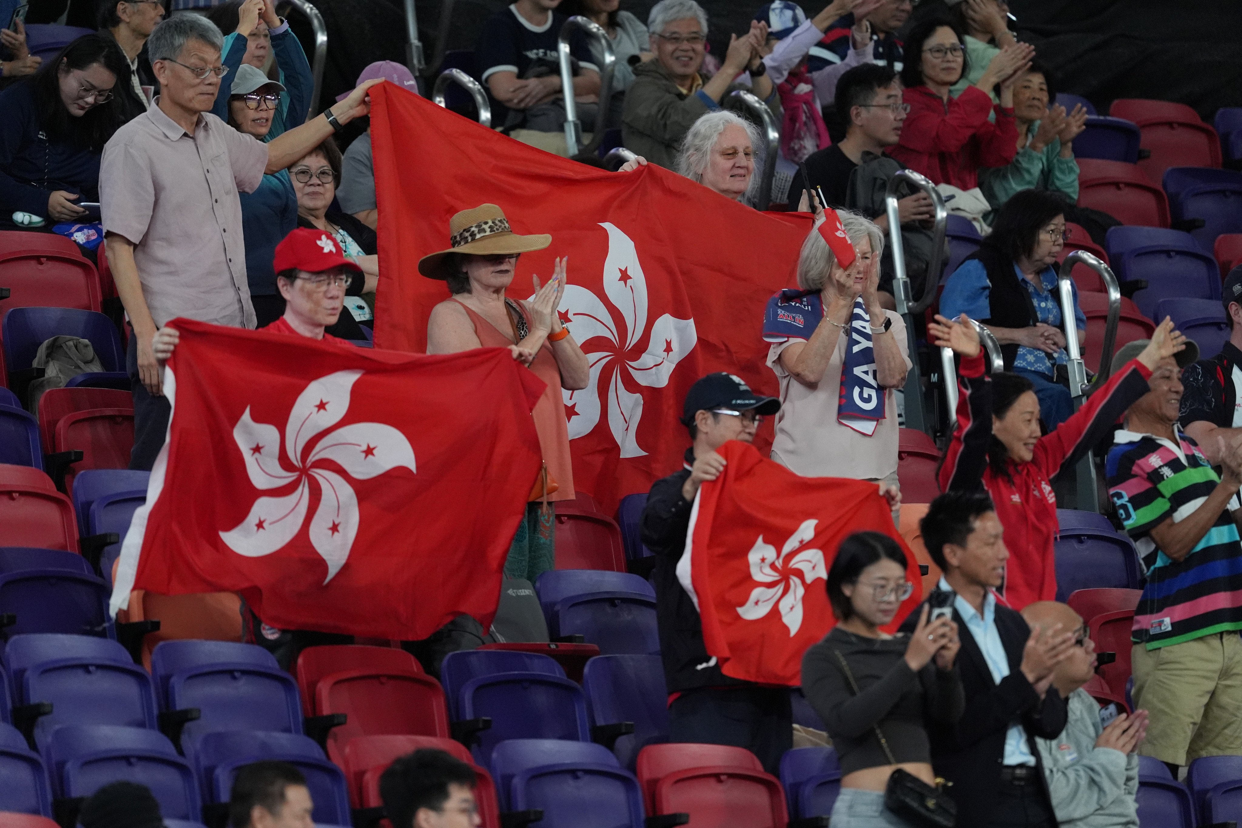 Hong Kong fans cheer on the women’s team during the National Games rugby sevens tournament at Kai Tak Stadium. Photo: Elson Li