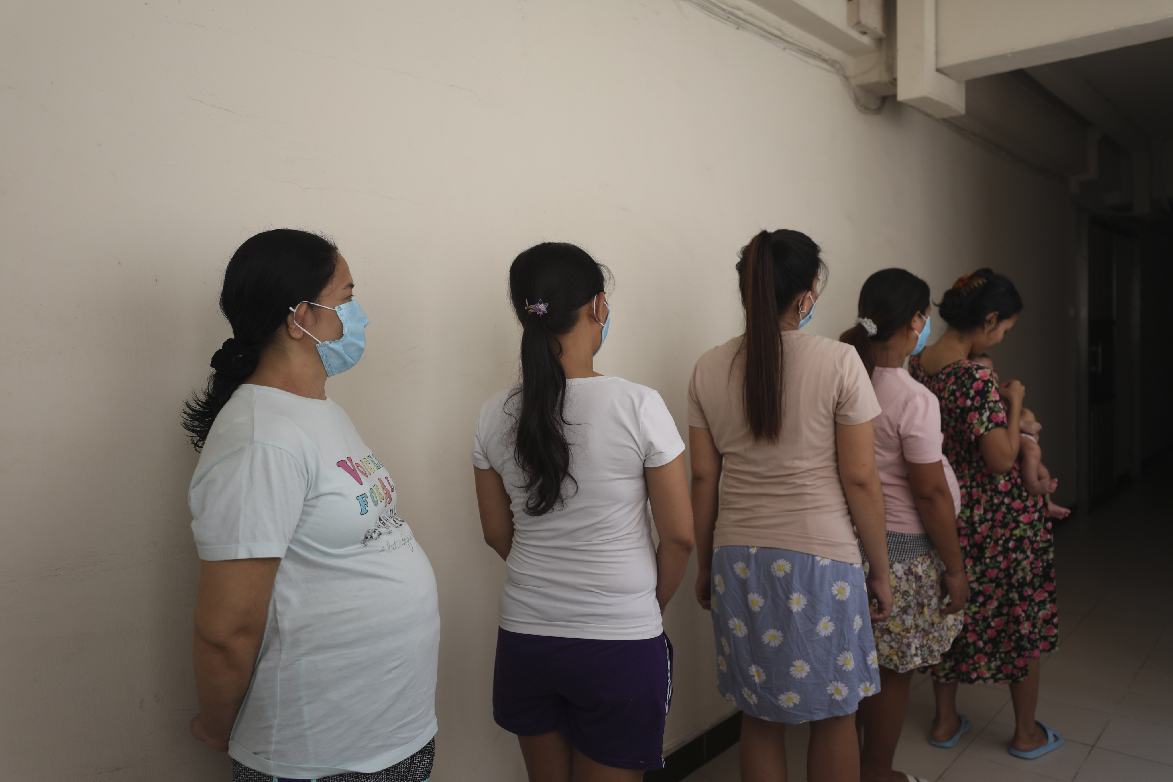 Pregnant domestic workers in Hong Kong face job insecurity and legal challenges, prompting calls for better education and support services. Photo: Xiaomei Chen