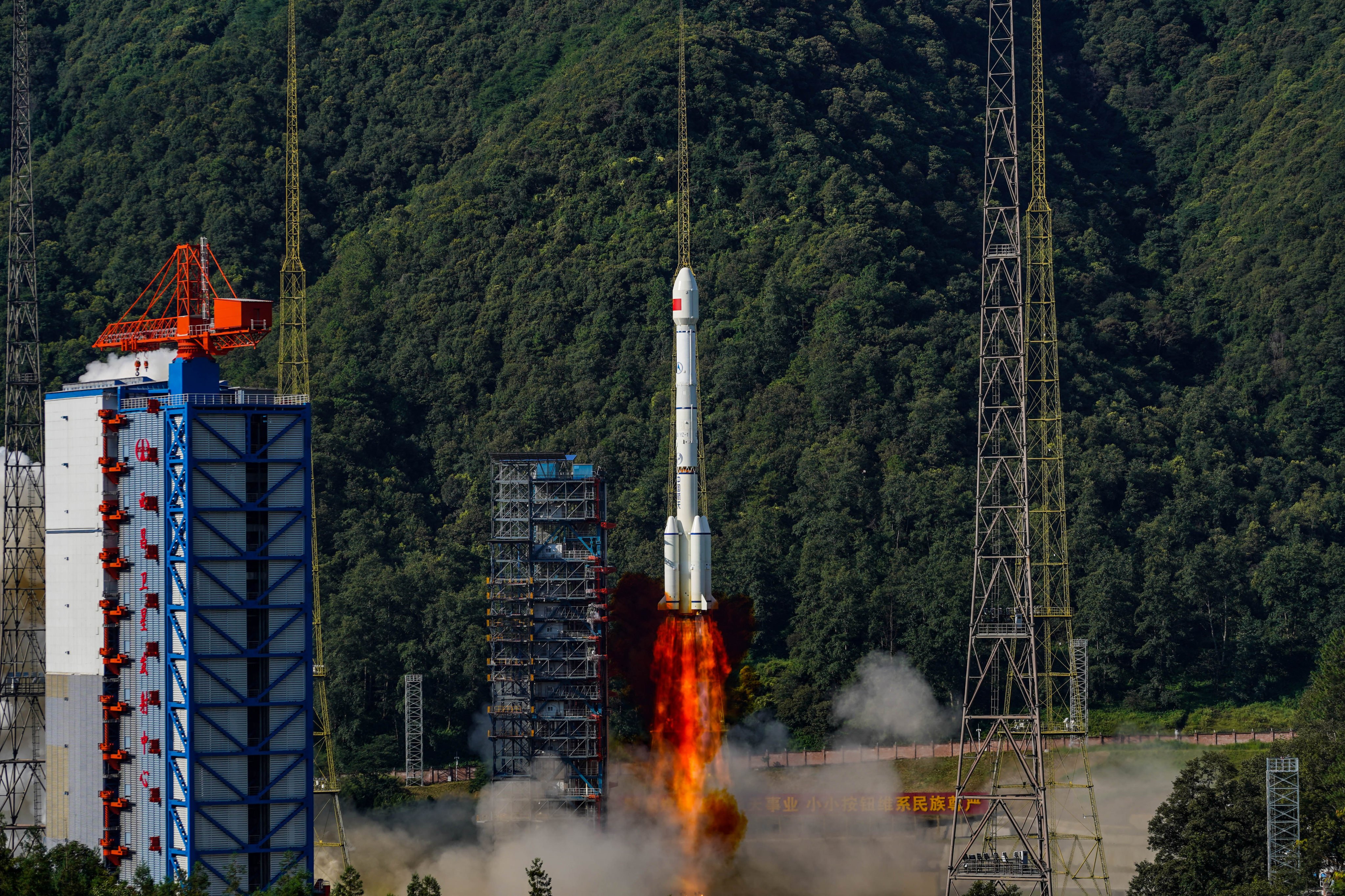 A Long March-3B rocket carrying a cluster of BeiDou satellites blasts off from a launch site in southwest China last year. Photo: Xinhua