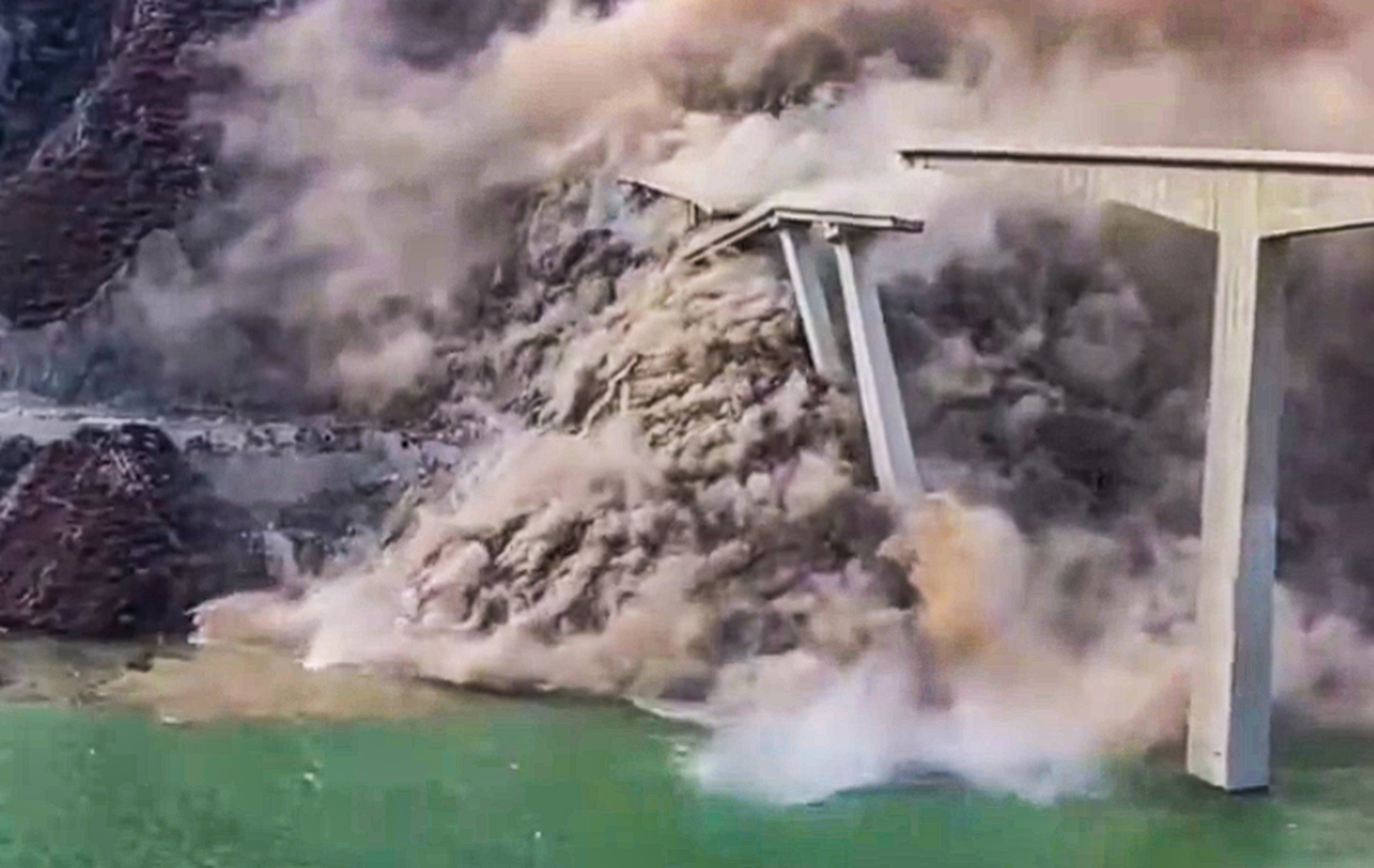 Videos circulating on social media show part of the Shuangjiangkou Hongqi Bridge in Sichuan province giving way. Photo: Handout