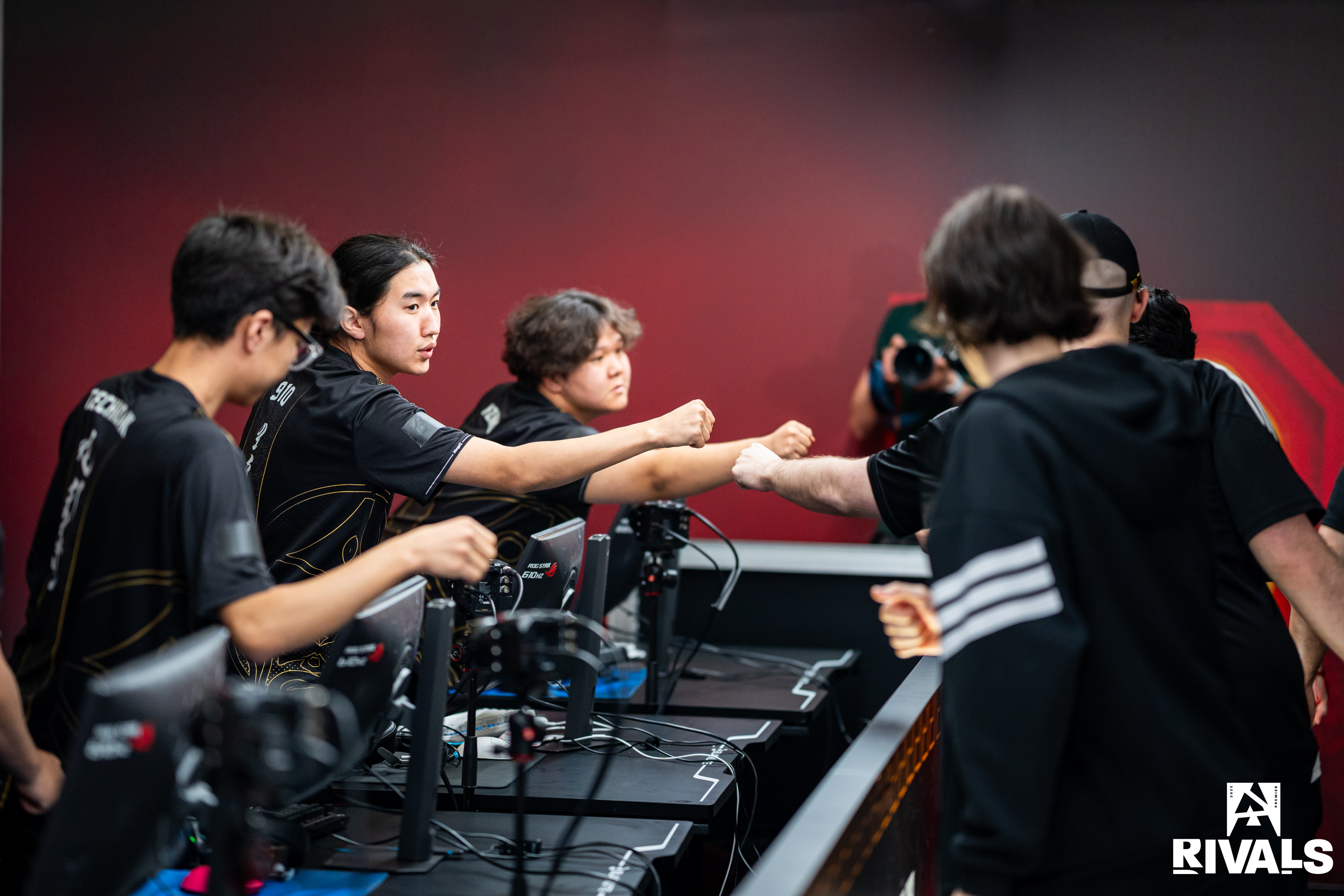 The MongolZ shake hands with Passion UA post-match. Photos: Handout