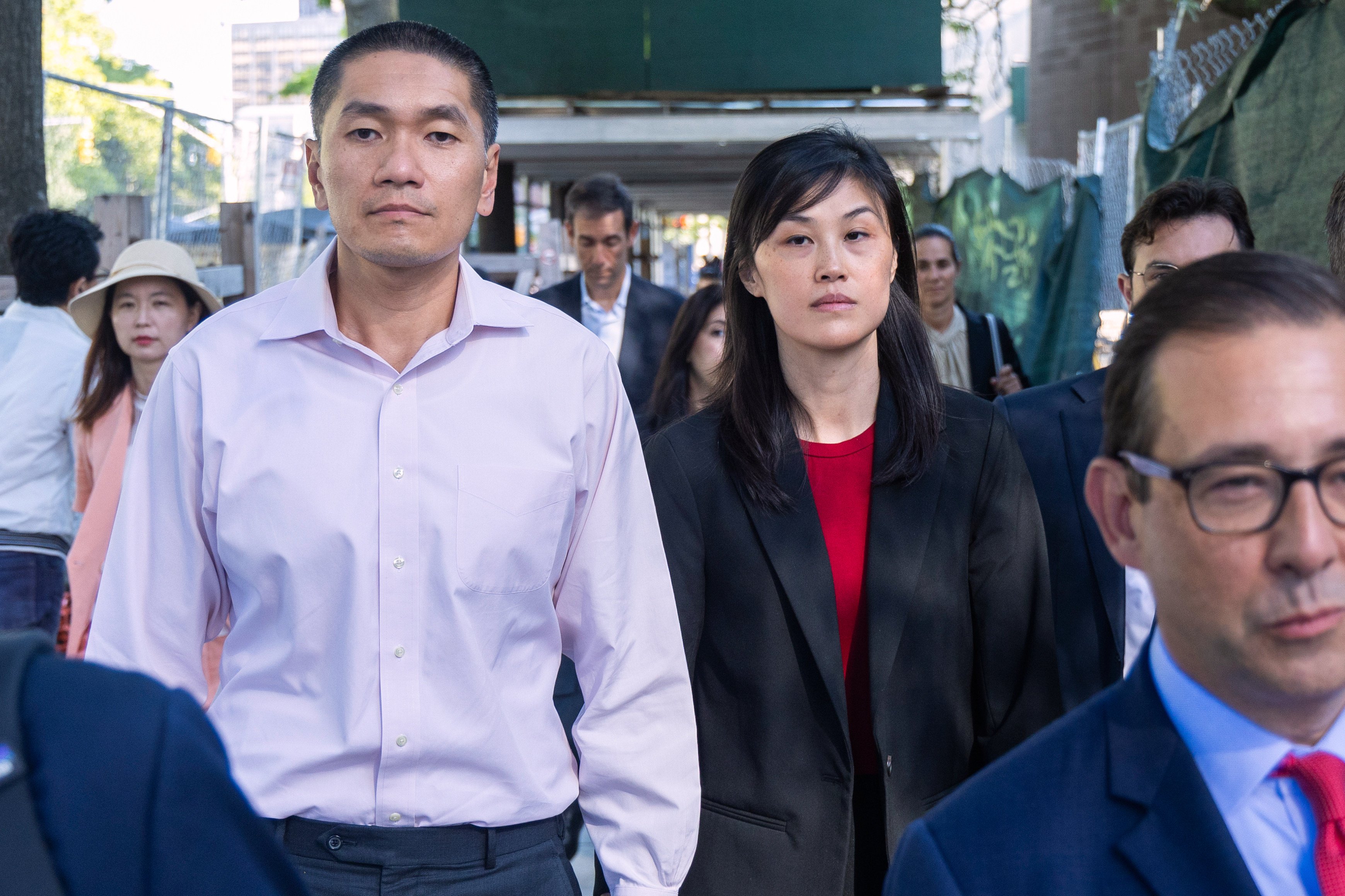 Linda Sun and her husband, Christopher Hu, leave Brooklyn Federal Court after their arraignment in September 2024. Photo: AP
