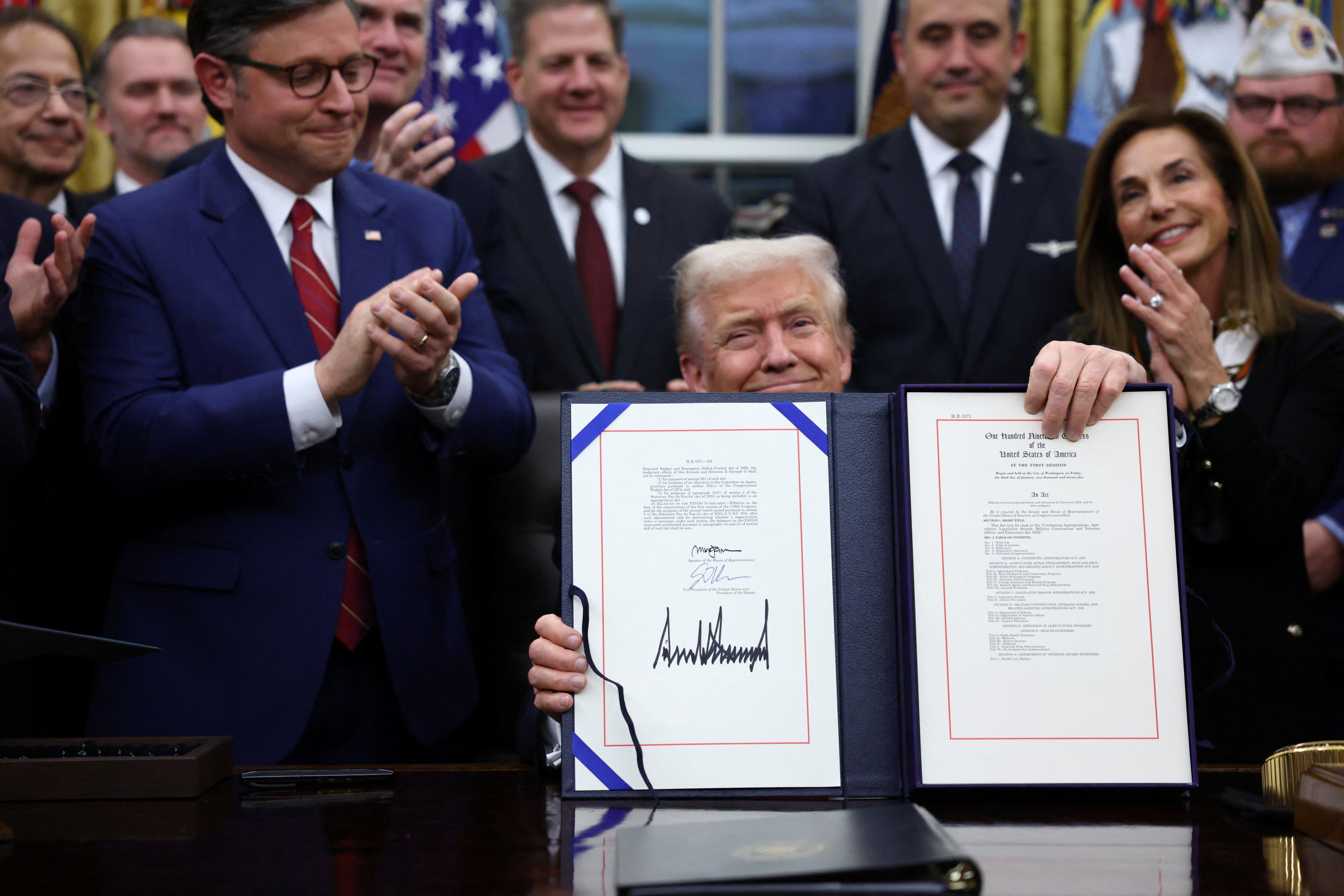 US President Donald Trump after signing the funding bill to end the US government shutdown. Photo: Reuters