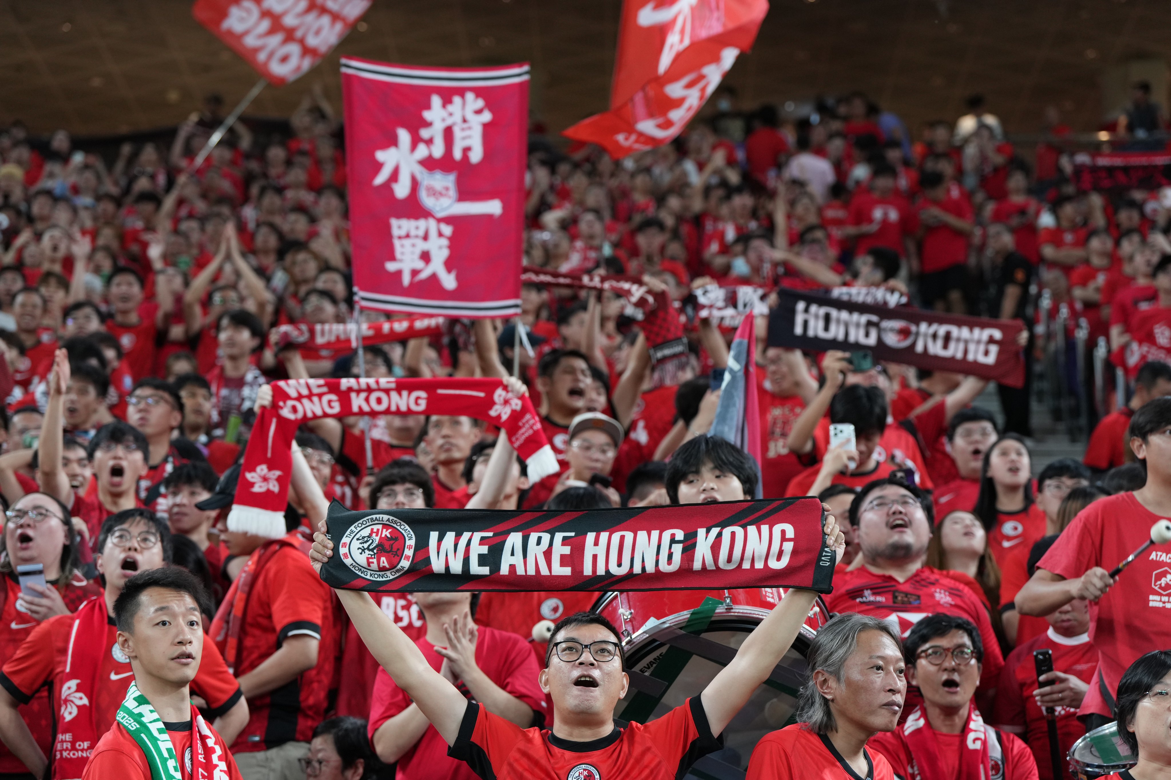 Supporters cheer for Hong Kong during an AFC Asian Cup qualifying match against Bangladesh at Kai Tak Stadium on October 14. Photo: Sam Tsang