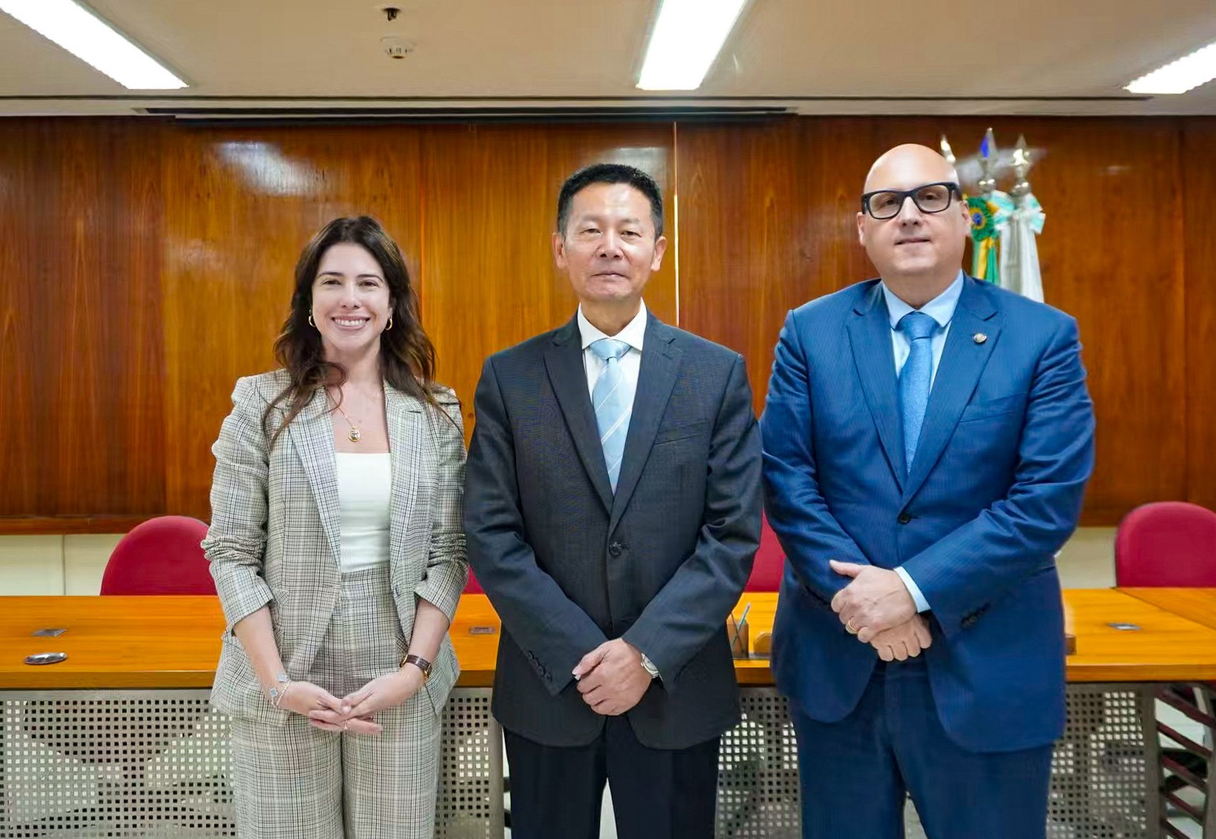 A photo issued by the China Securities Regulatory Commission shows chairman Wu Qing (centre) with officials from France and Brazil. Photo: Handout
